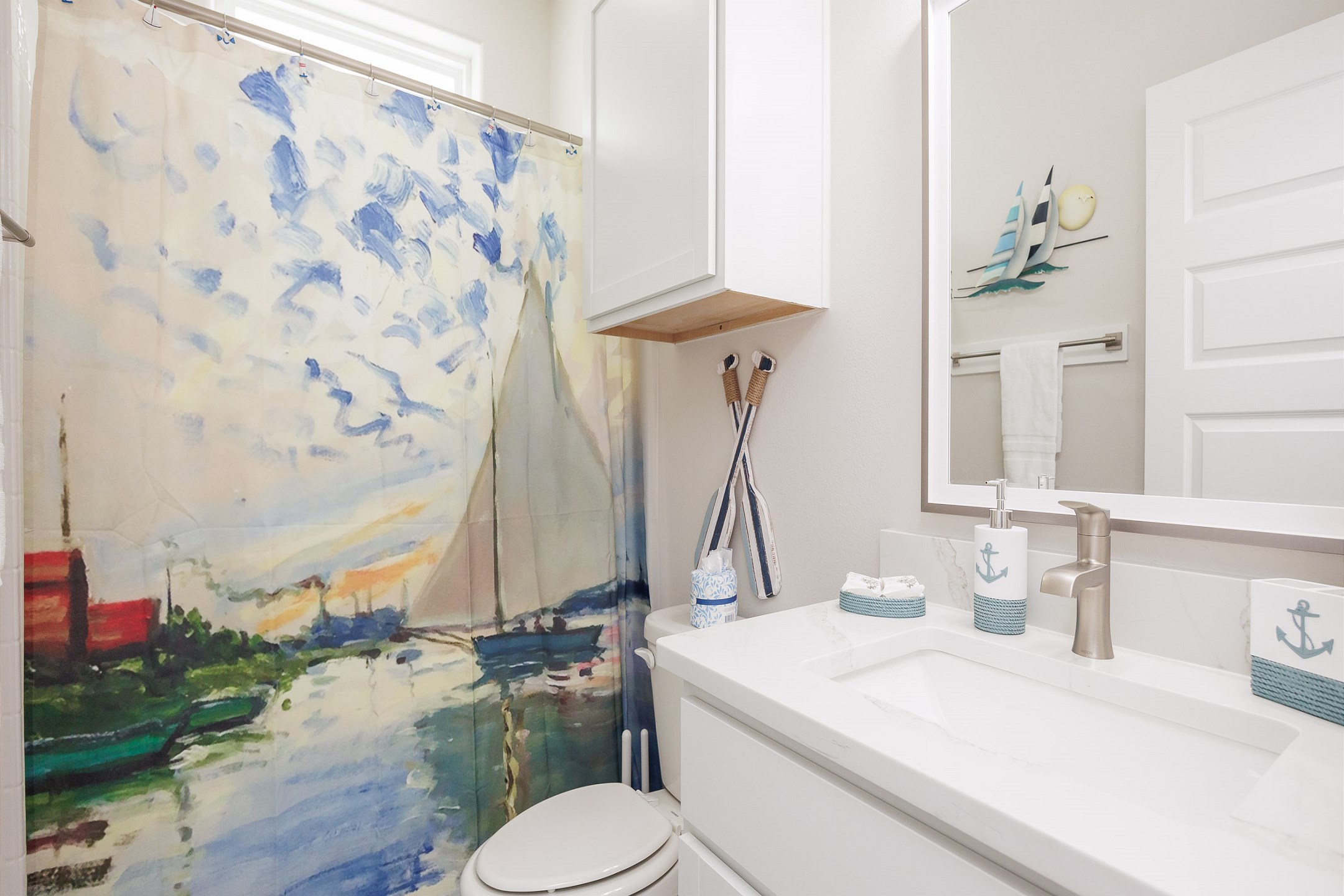 Guest bathroom on the first floor with walk in shower 