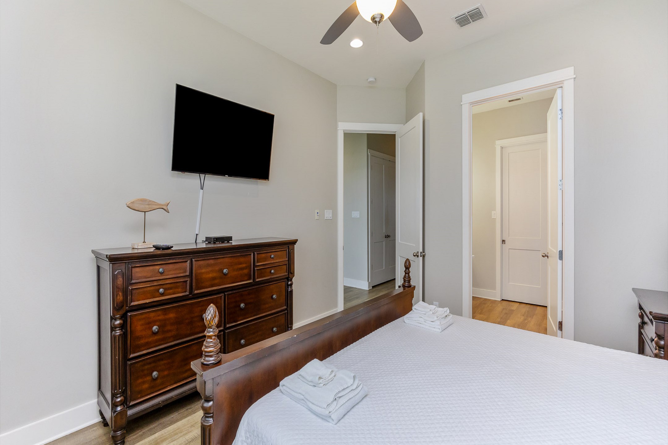 Master bedroom on the third floor with a king size bed, ensuite bathroom and flat screen TV