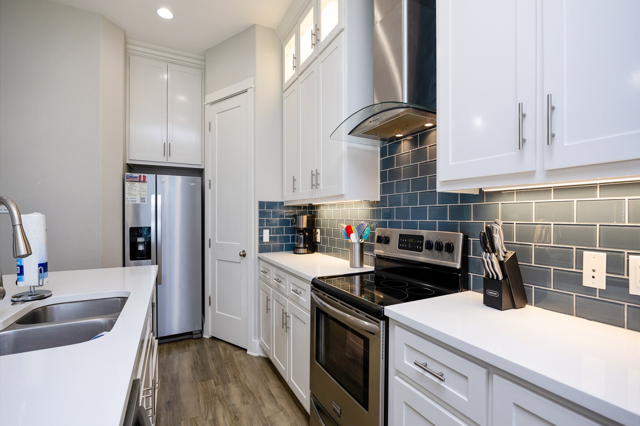 Beautiful second floor kitchen with cookware, dinnerware, and other kitchen essentials provided
