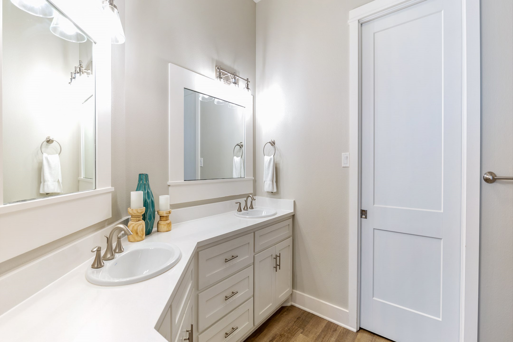 Stylish third-floor master bathroom with a contemporary double sink and a tub-shower combo