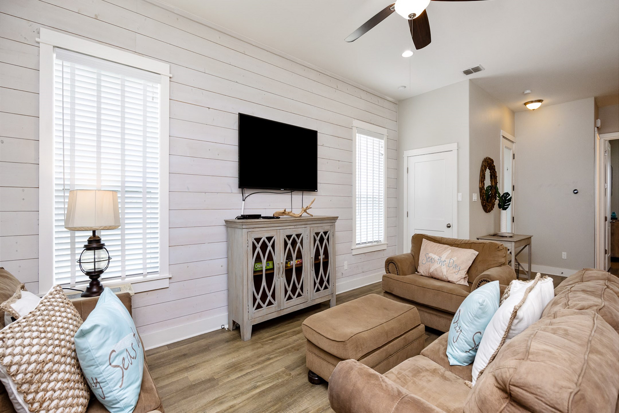 Bright and airy living area featuring a blend of comfort and style, ideal for both relaxation and entertaining