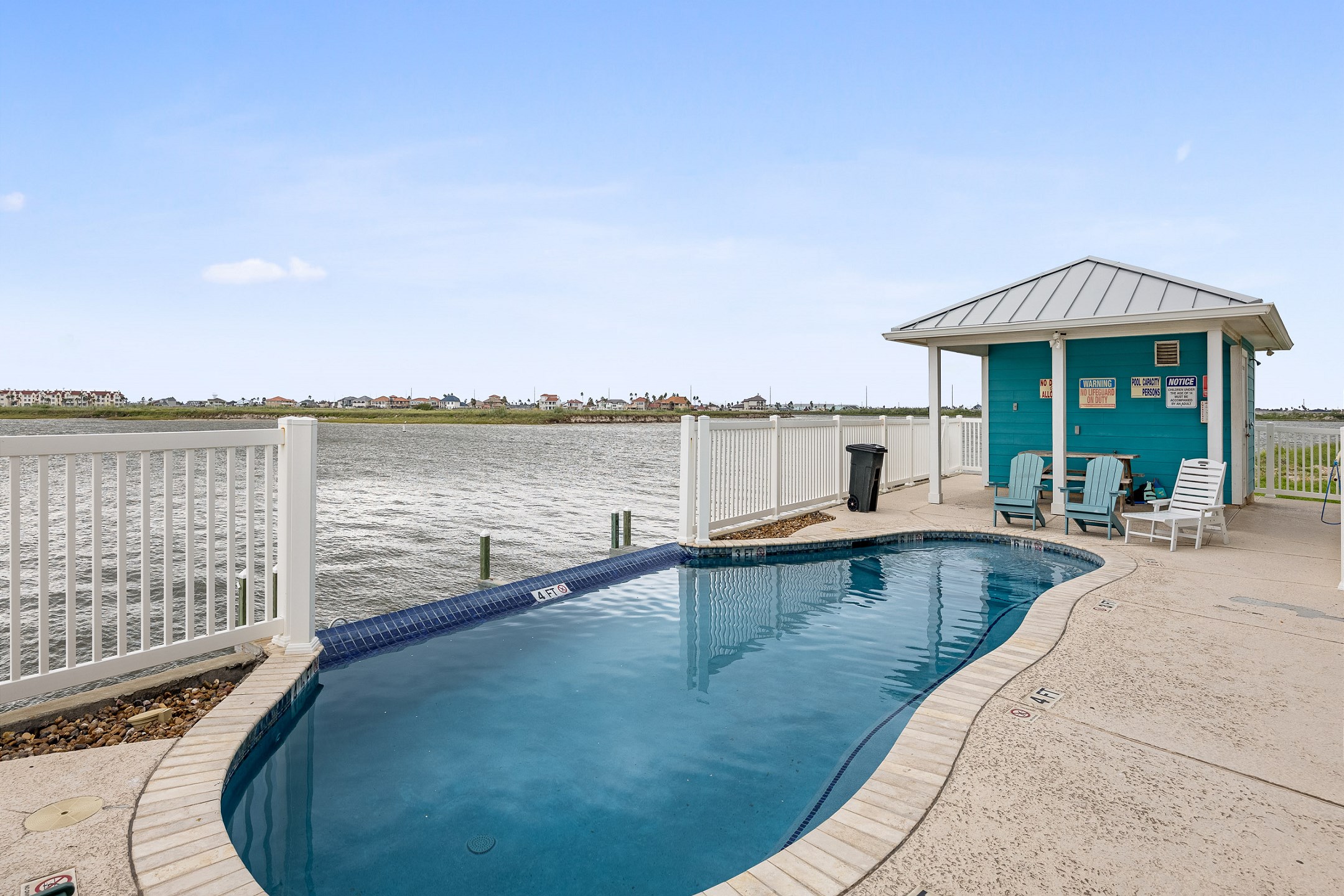 Enjoy water views while relaxing in the pool