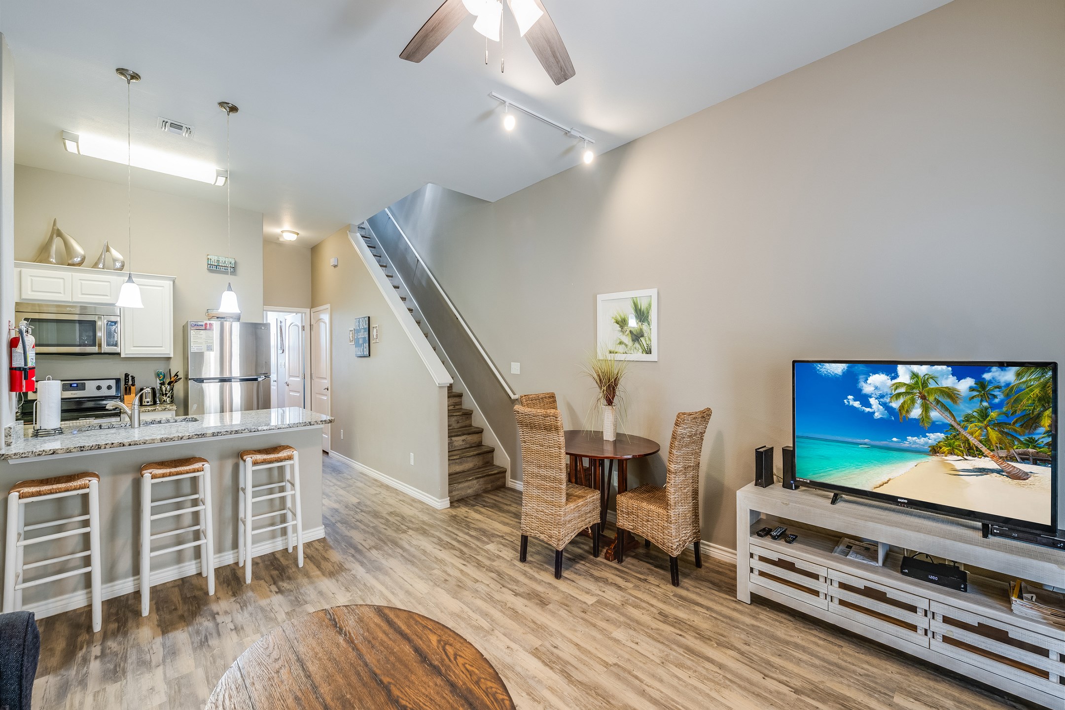 Relax in the living space and enjoy the entertainment center with flat-screen TV and streaming services