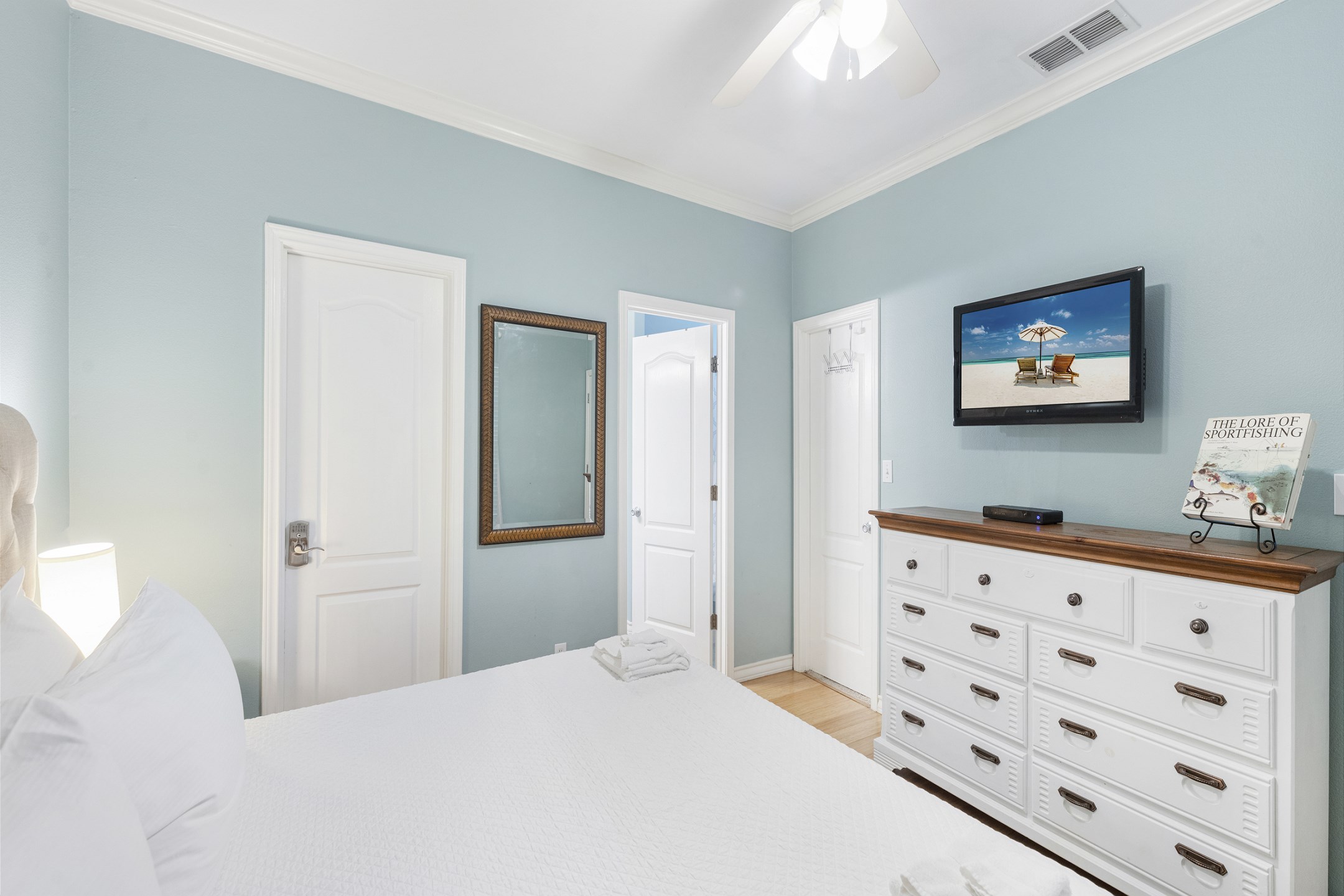 Master bedroom on the first floor with king size bed, ensuite bathroom and flat screen TV