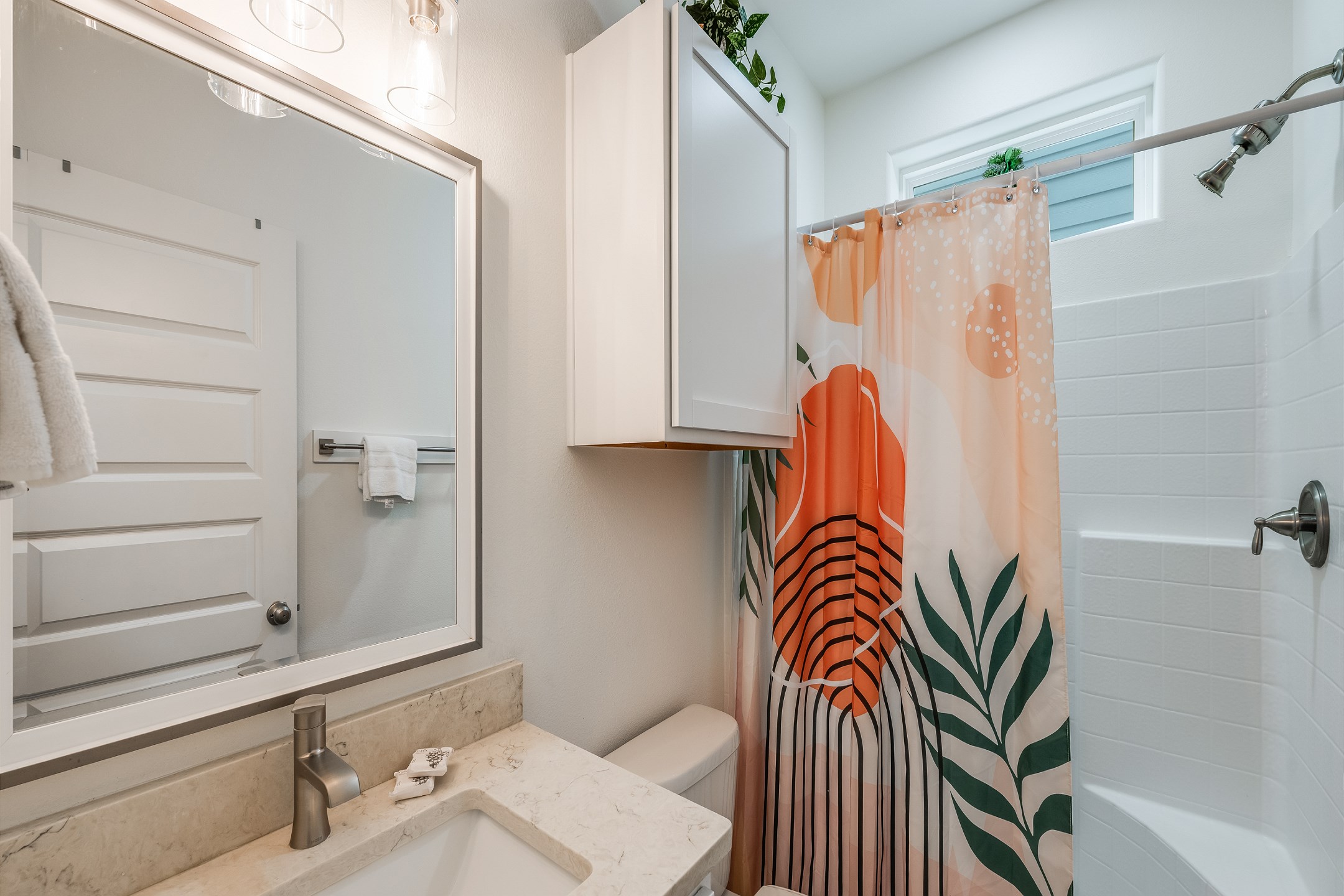 Guest bathroom on the first floor with walk in shower 