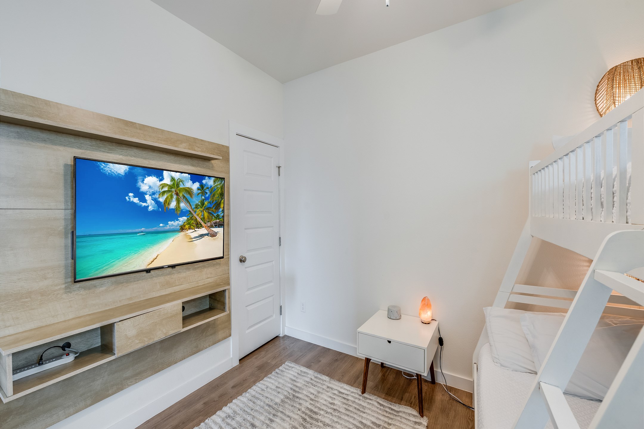 Third bedroom on the second floor with twin-over-full size bunk bed and a flat screen TV