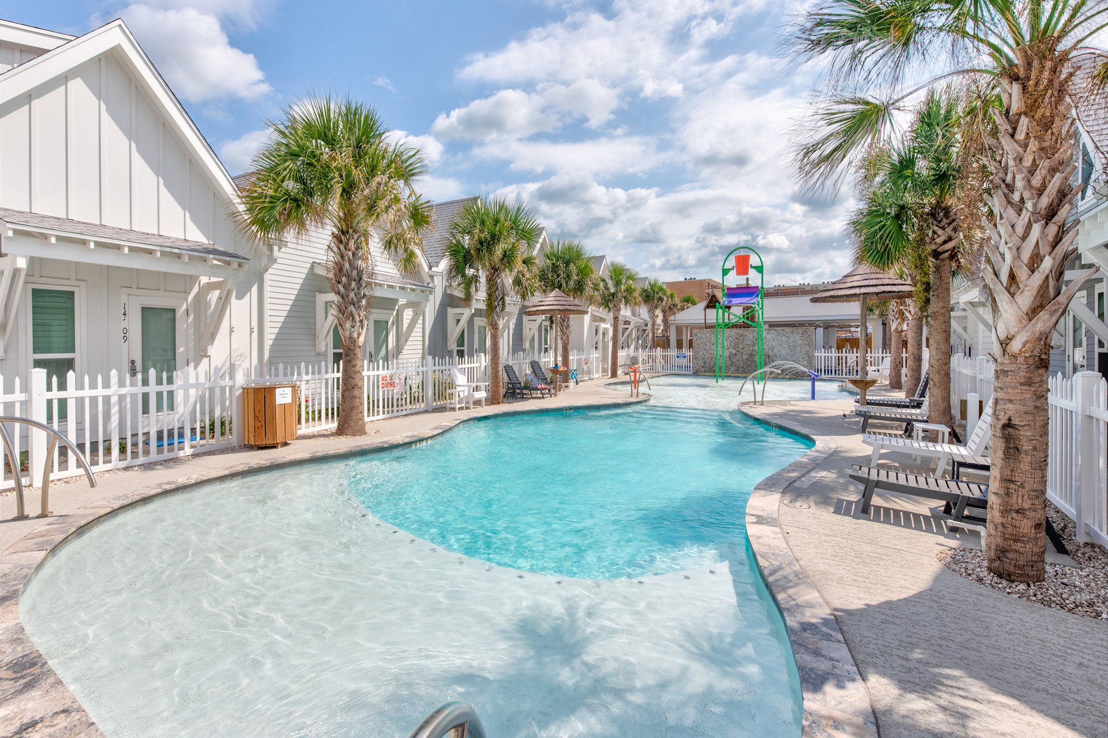 Pool that is heated in the cooler months with plenty of sun loungers to relax on