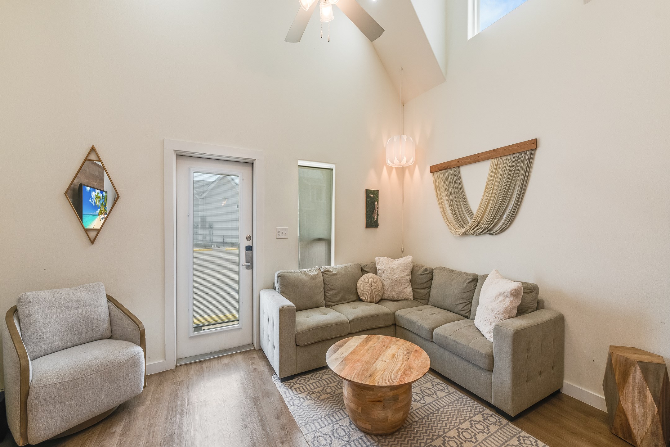 Relax in this spacious Living Room w/Vaulted Ceiling & Comfy Sleeper Sofa