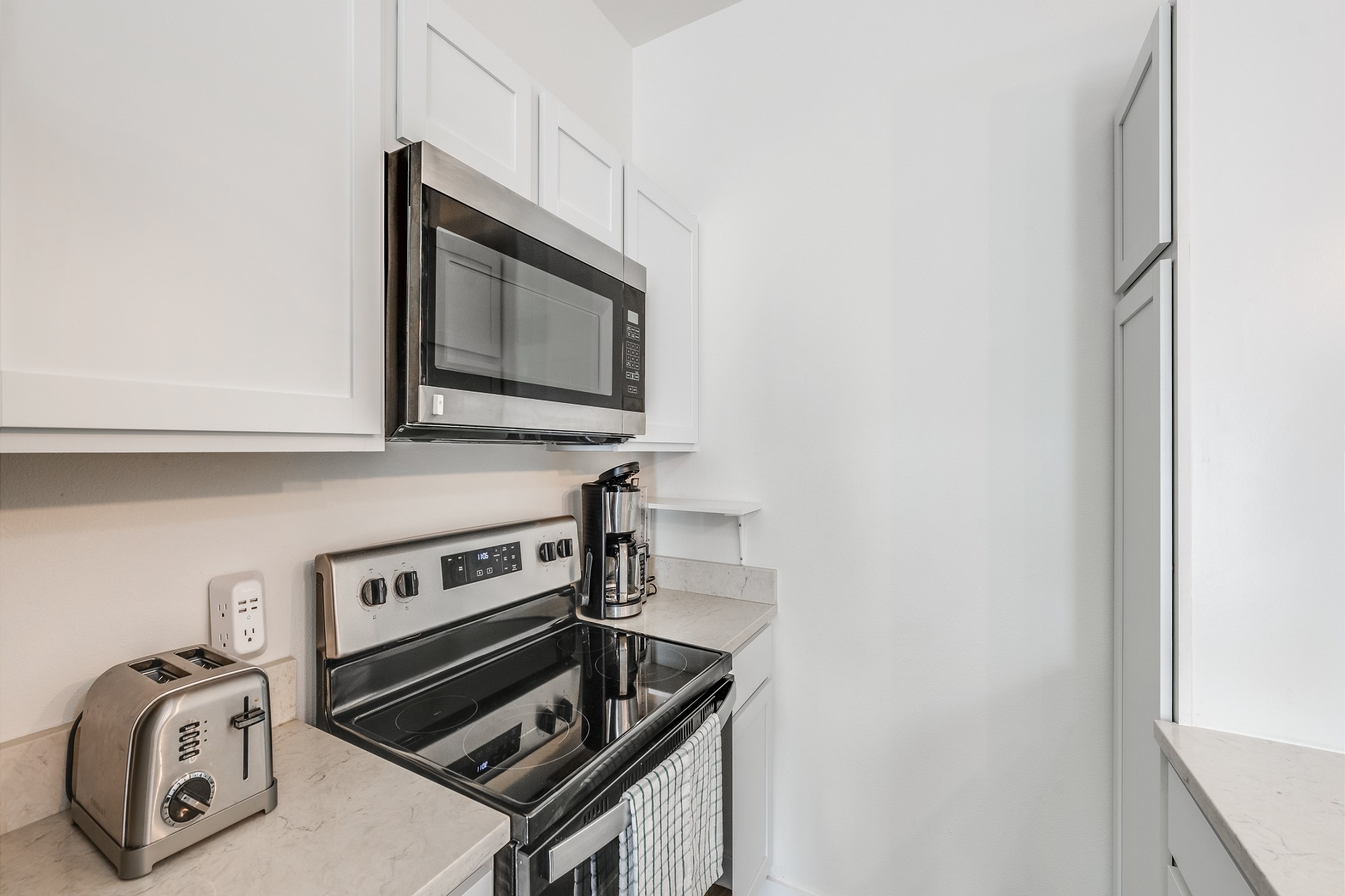 Start Your Day Right - Fully Equipped Kitchen with Coffeemaker.