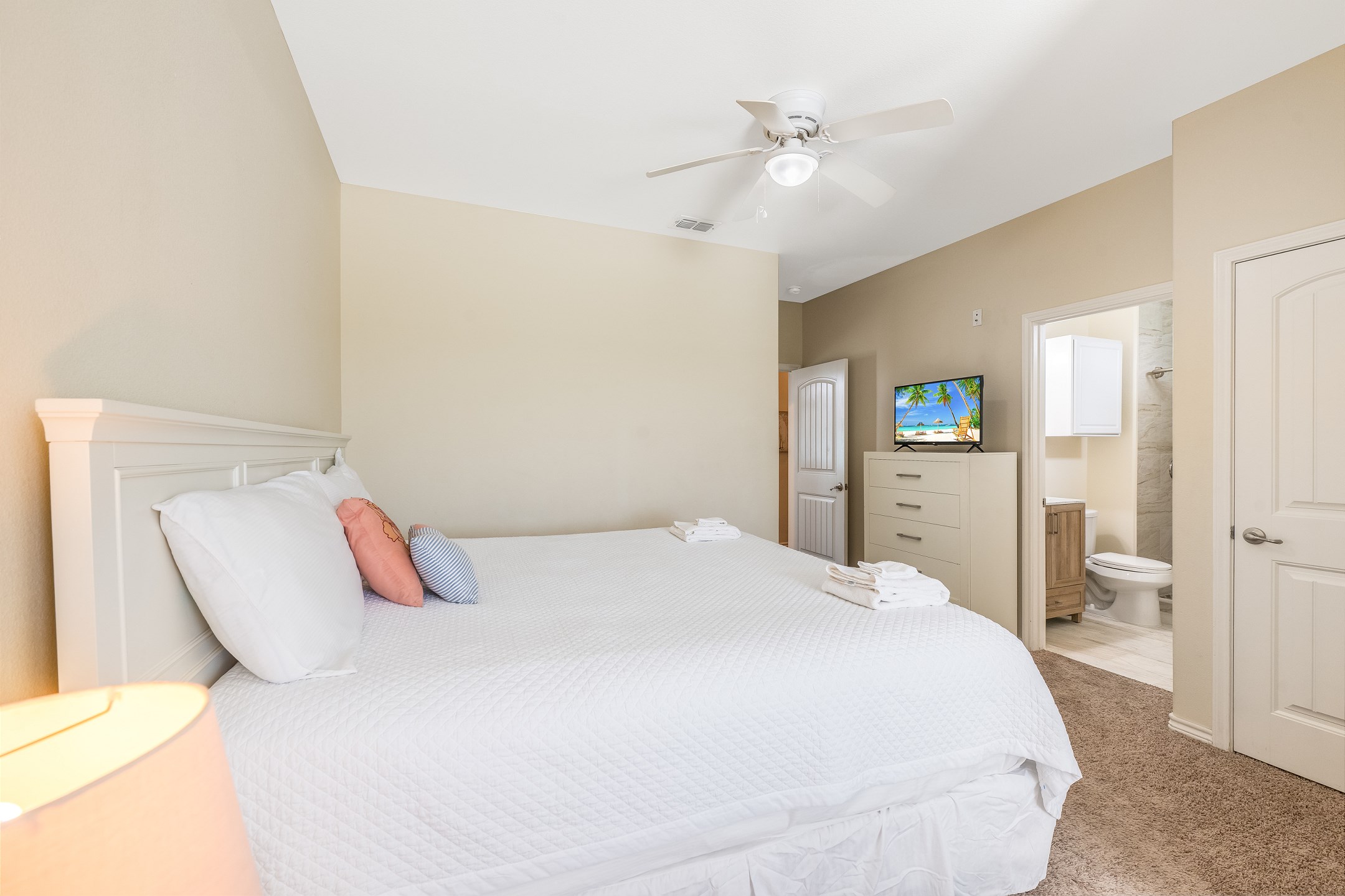 Fourth bedroom on the second floor with king size bed, private bathroom and flat screen TV