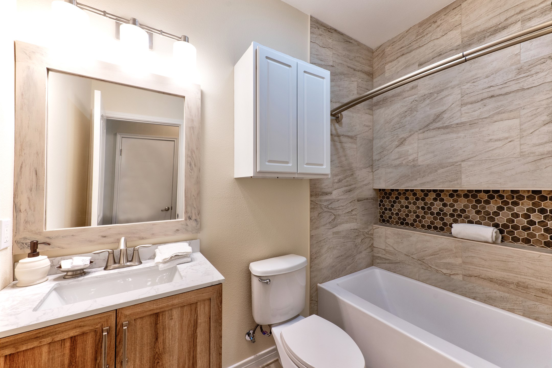Guest bathroom on the second floor with tub/shower combo
