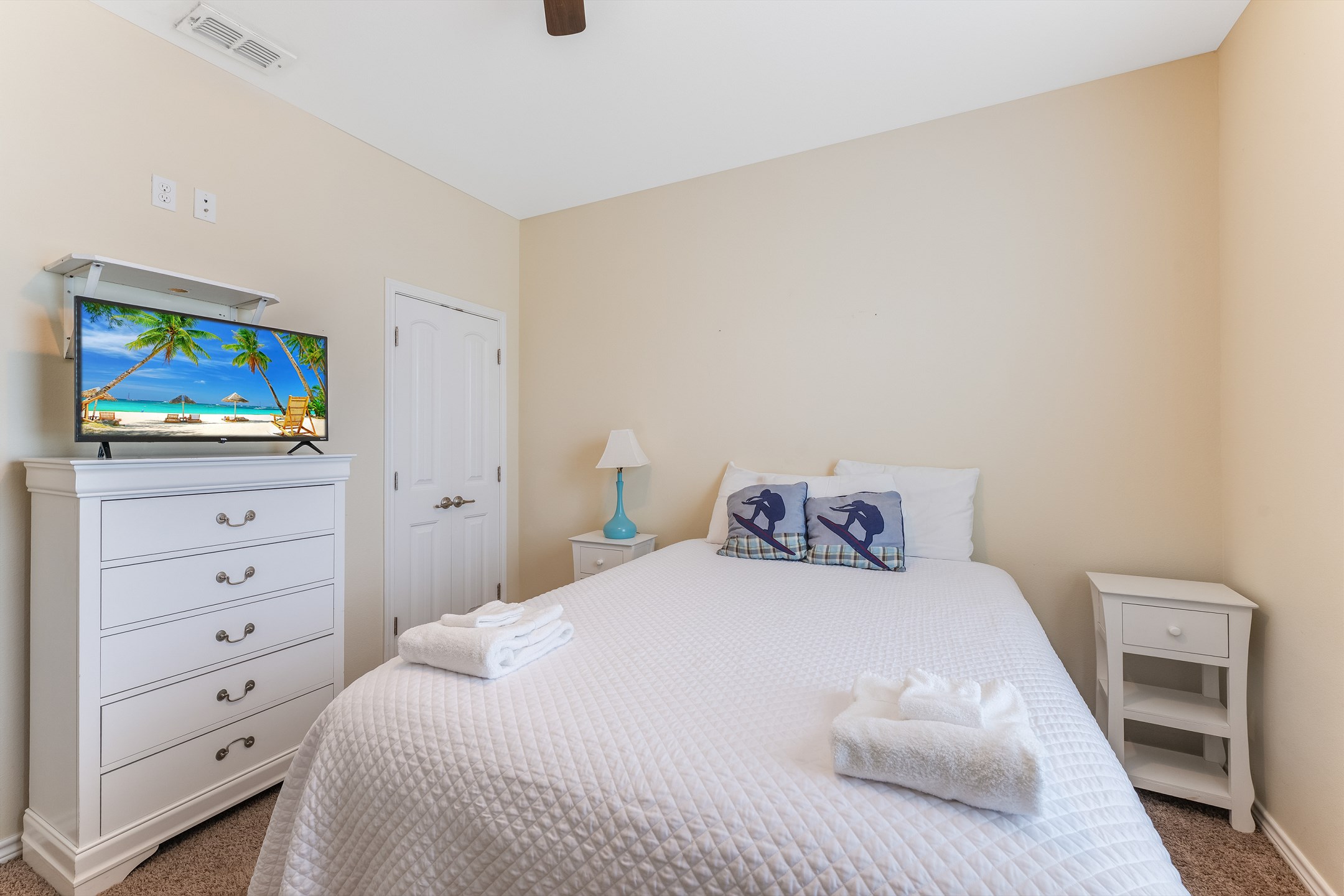 Third bedroom on the second floor with queen size bed and flat screen TV