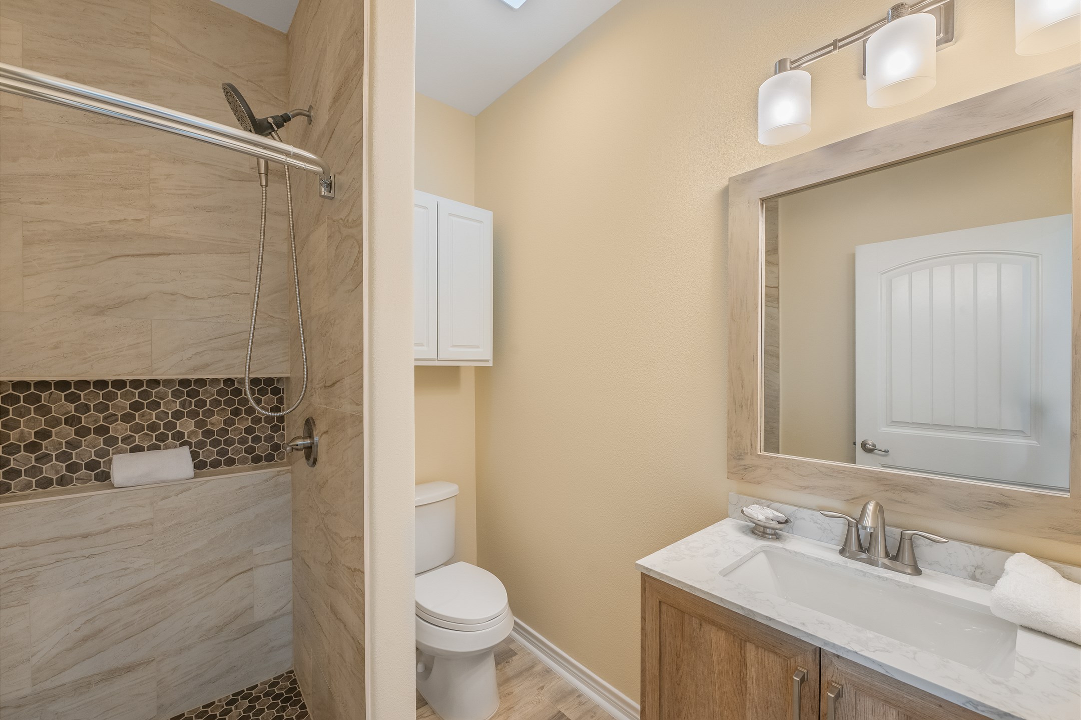 Guest bathroom on the first floor with walk in shower