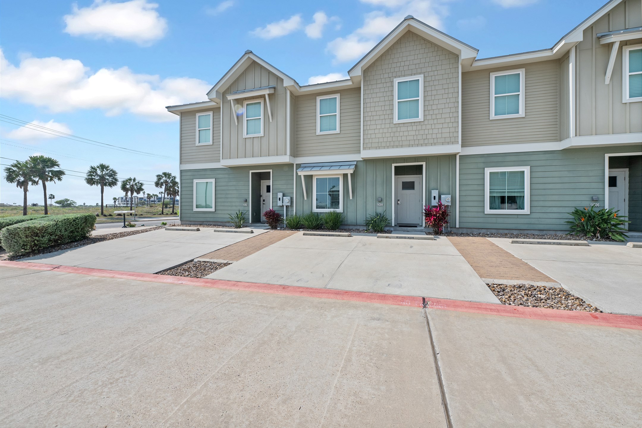 Two designated parking spaces in front of property