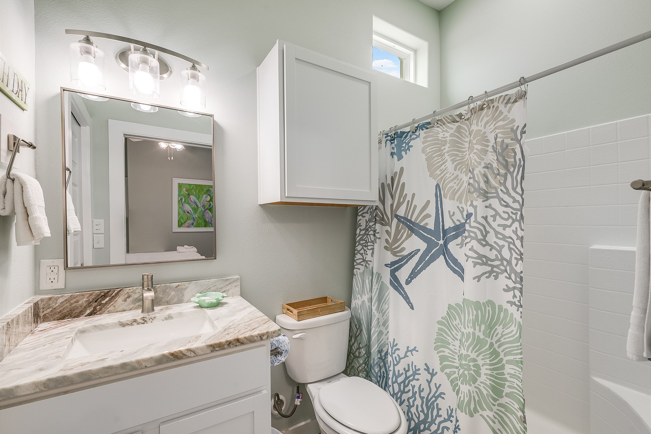 Master bath with sleek granite counters and a spacious walk-in shower
