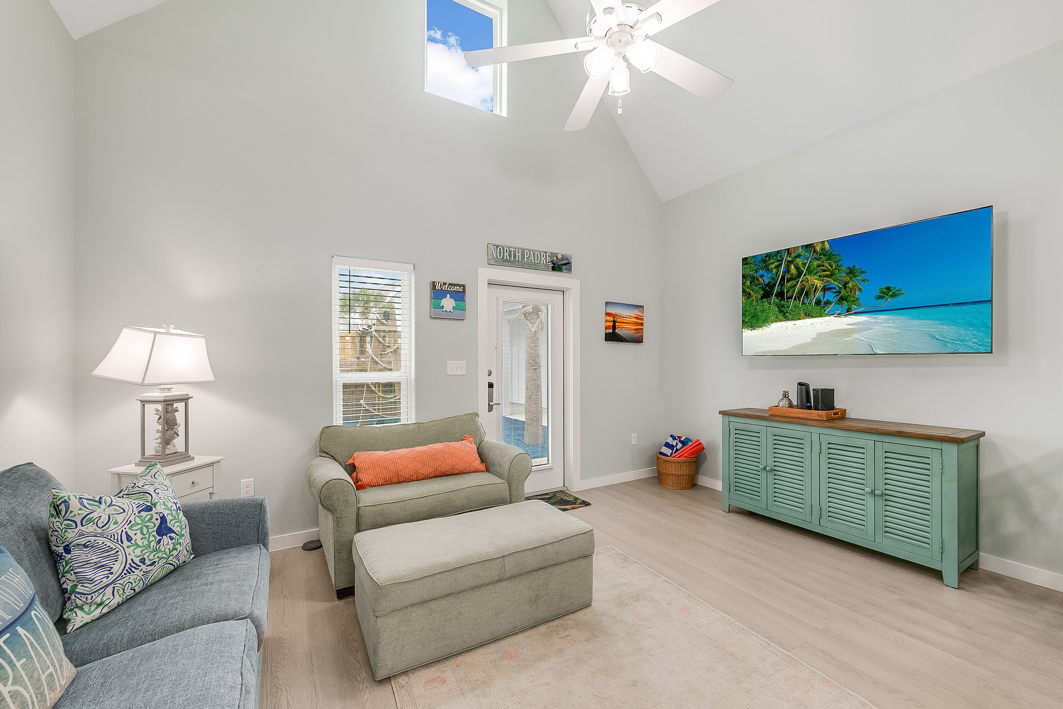 Comfy living space made for chill time—TV included