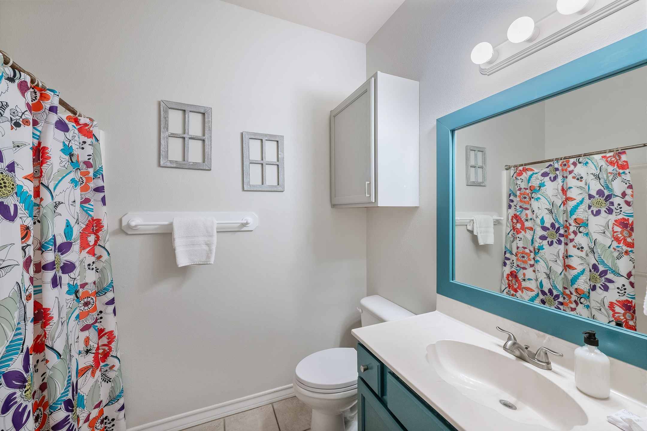 Guest bathroom located on second floor with shower /tub combo 