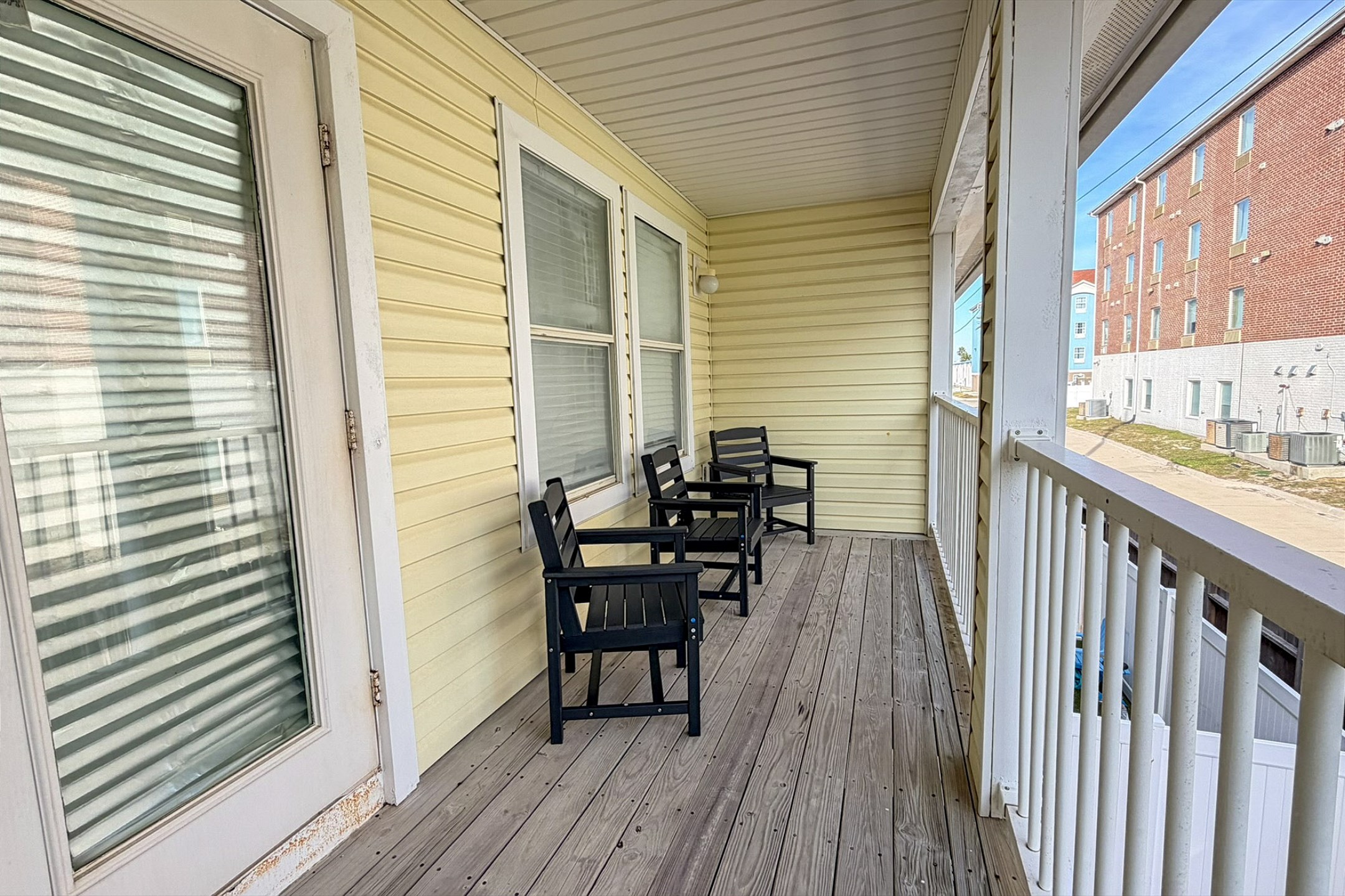 Private balcony off the loft area with seating so you can sit and relax on your vacation