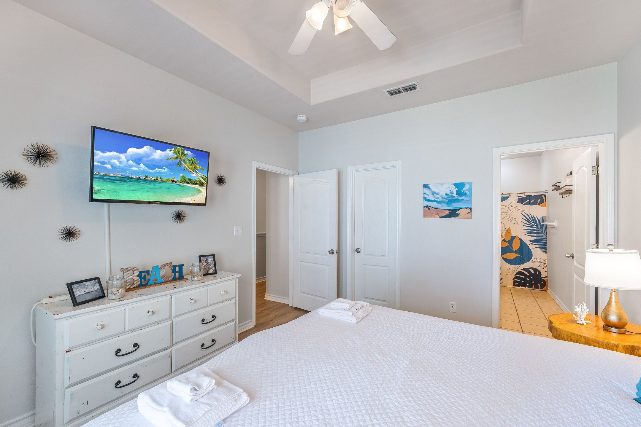 Master bedroom on the second floor with king size bed and private bathroom 