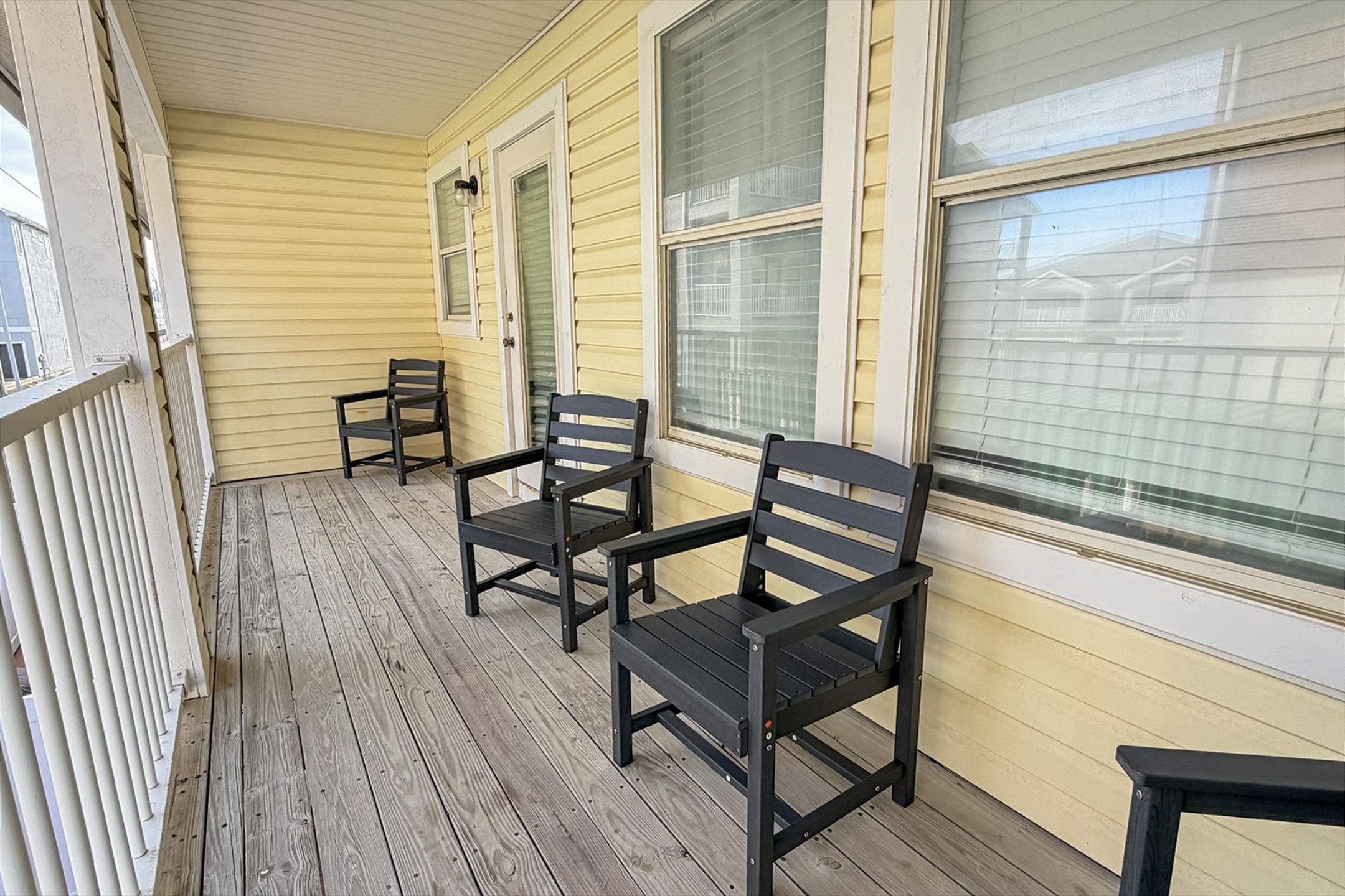 Private balcony off the loft area with seating so you can sit and relax on your vacation