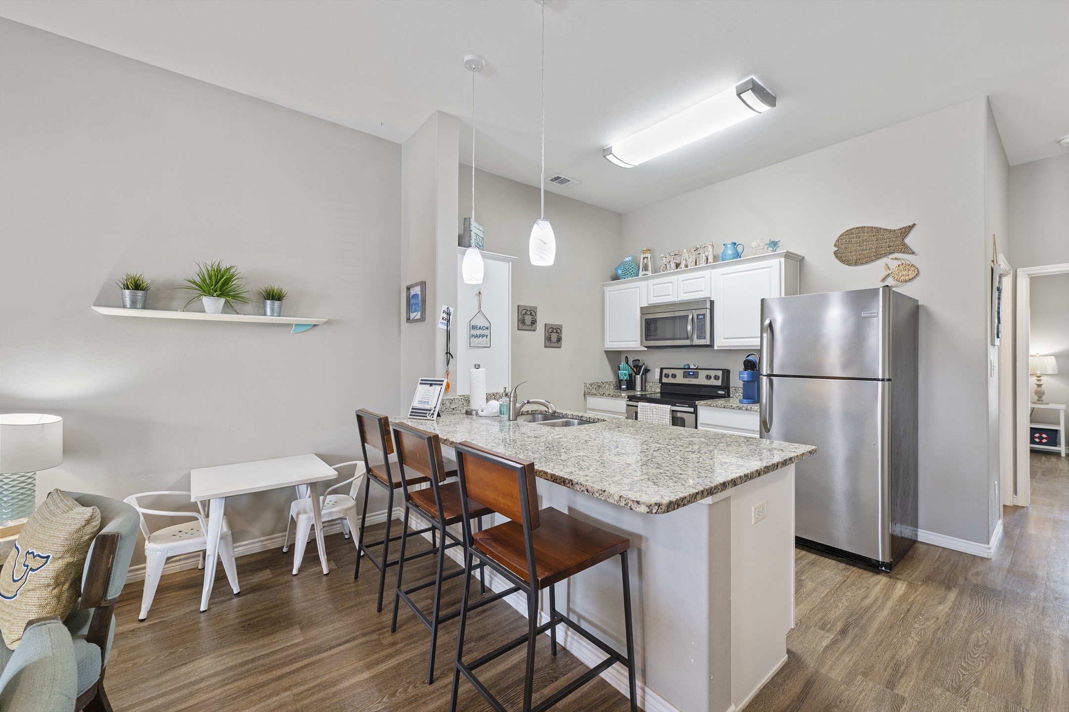 Enjoy a fully equipped kitchen with sleek stainless steel appliances for whipping up all the vacation meals