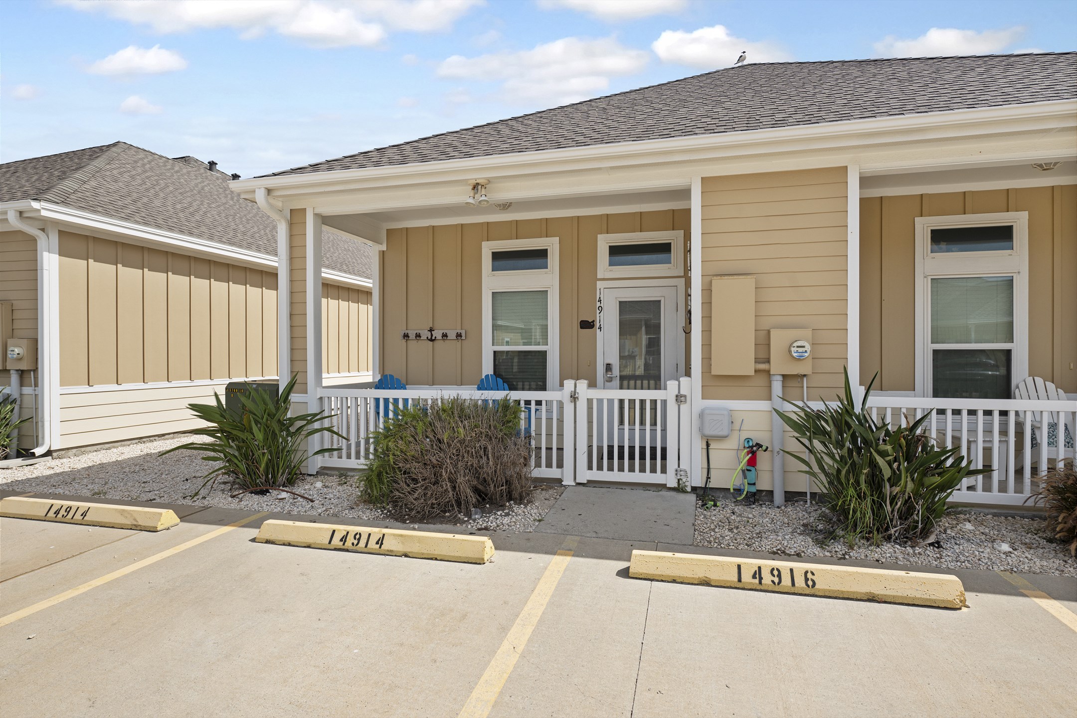 Pull up and relax—two designated parking spots right outside your shaded patio
