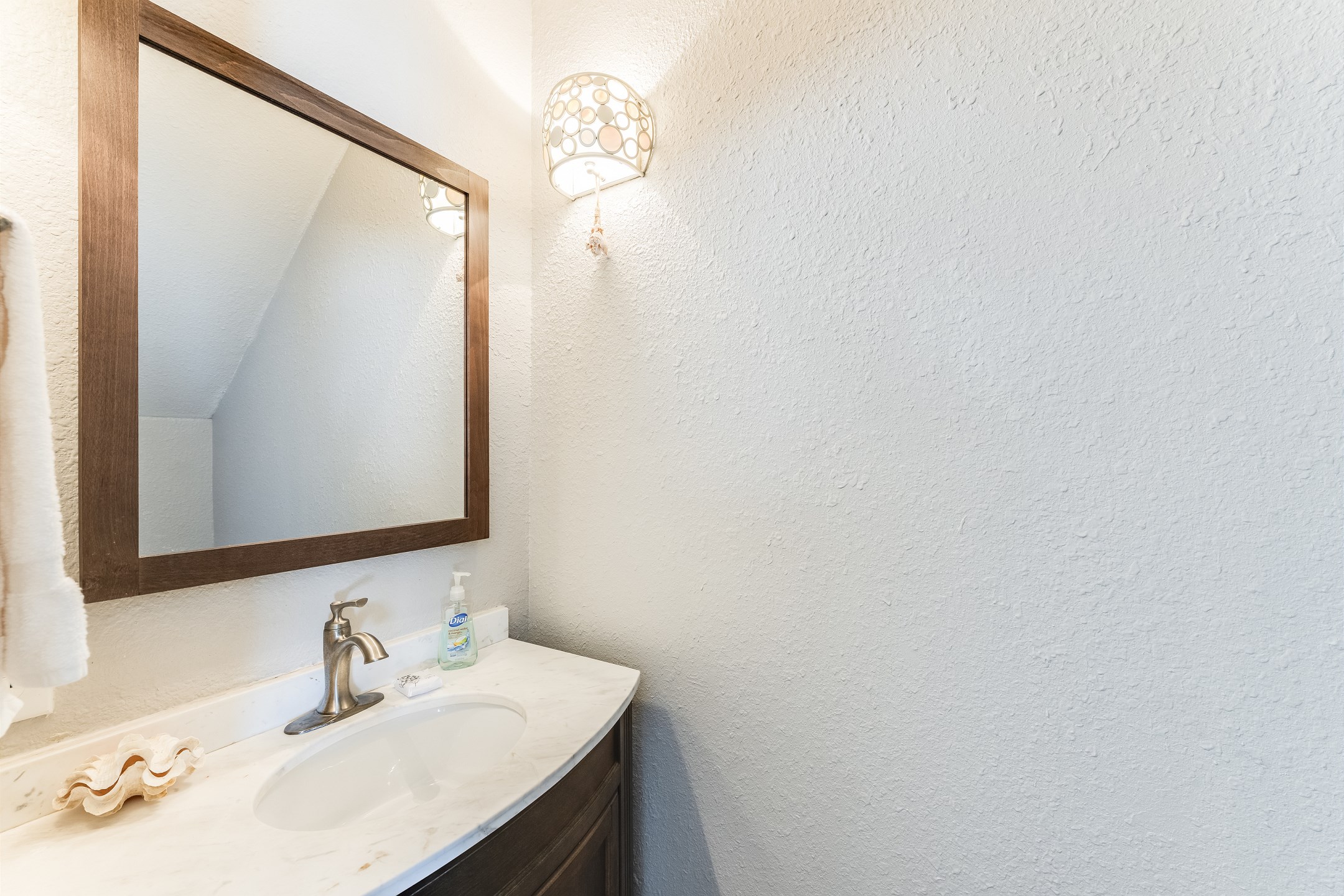 Handy half bath just steps from the action — because convenience is key on vacation