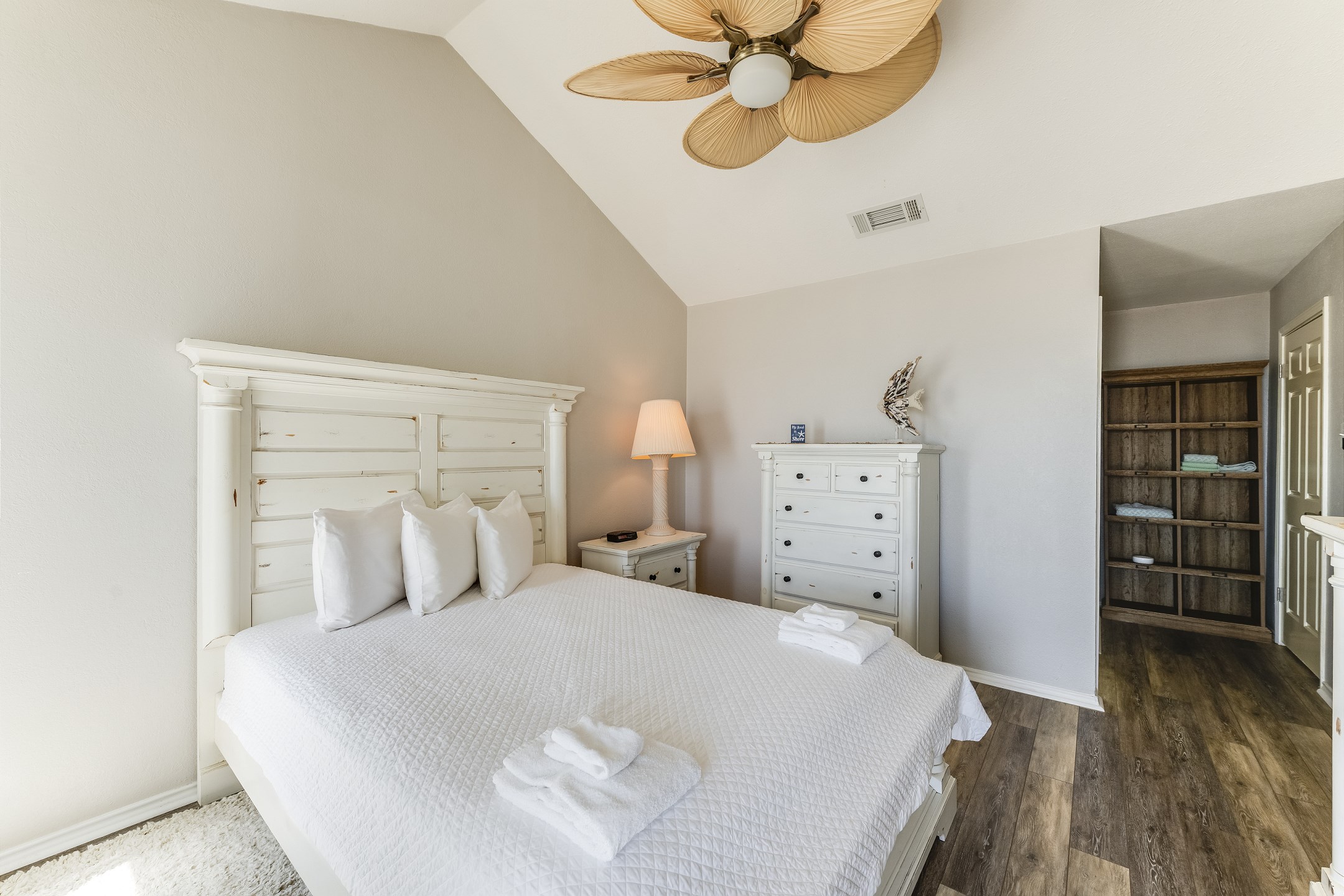 A dreamy retreat after a day at the beach — complete with vaulted ceilings and vacation vibes