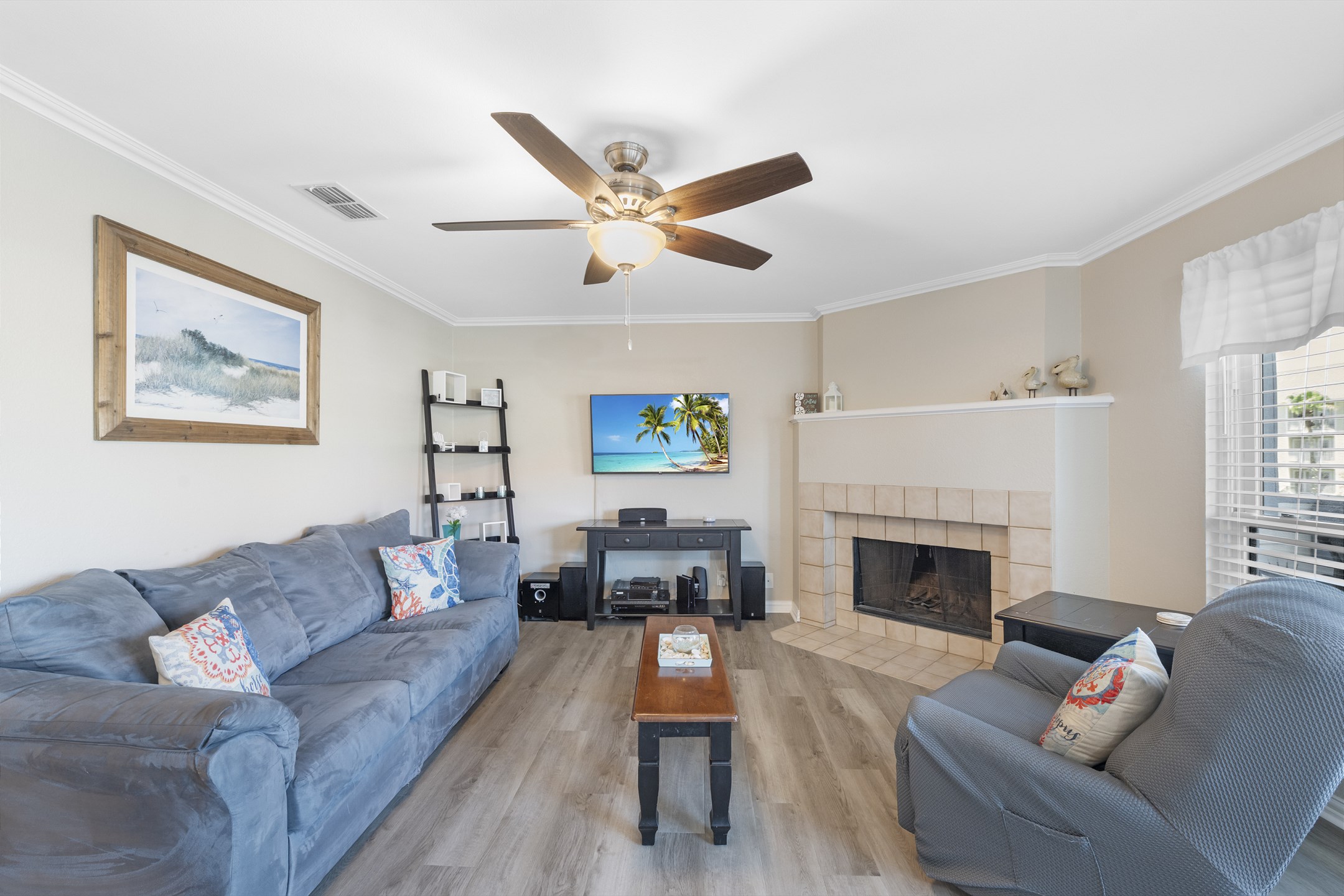 Relax in the living room with a comfy Queen sleeper sofa and a cozy recliner