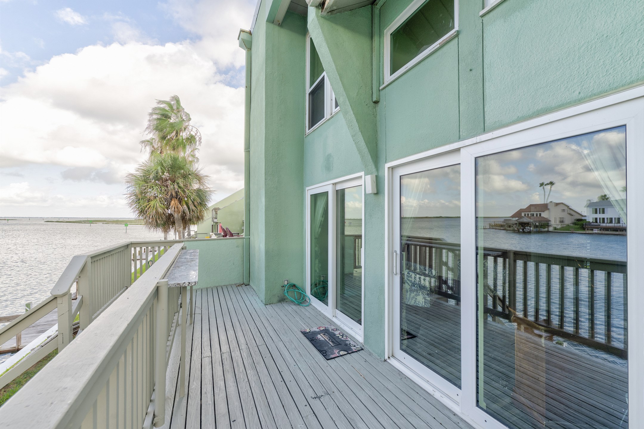 Private patio space off the living space for easy water access and amazing sunset views