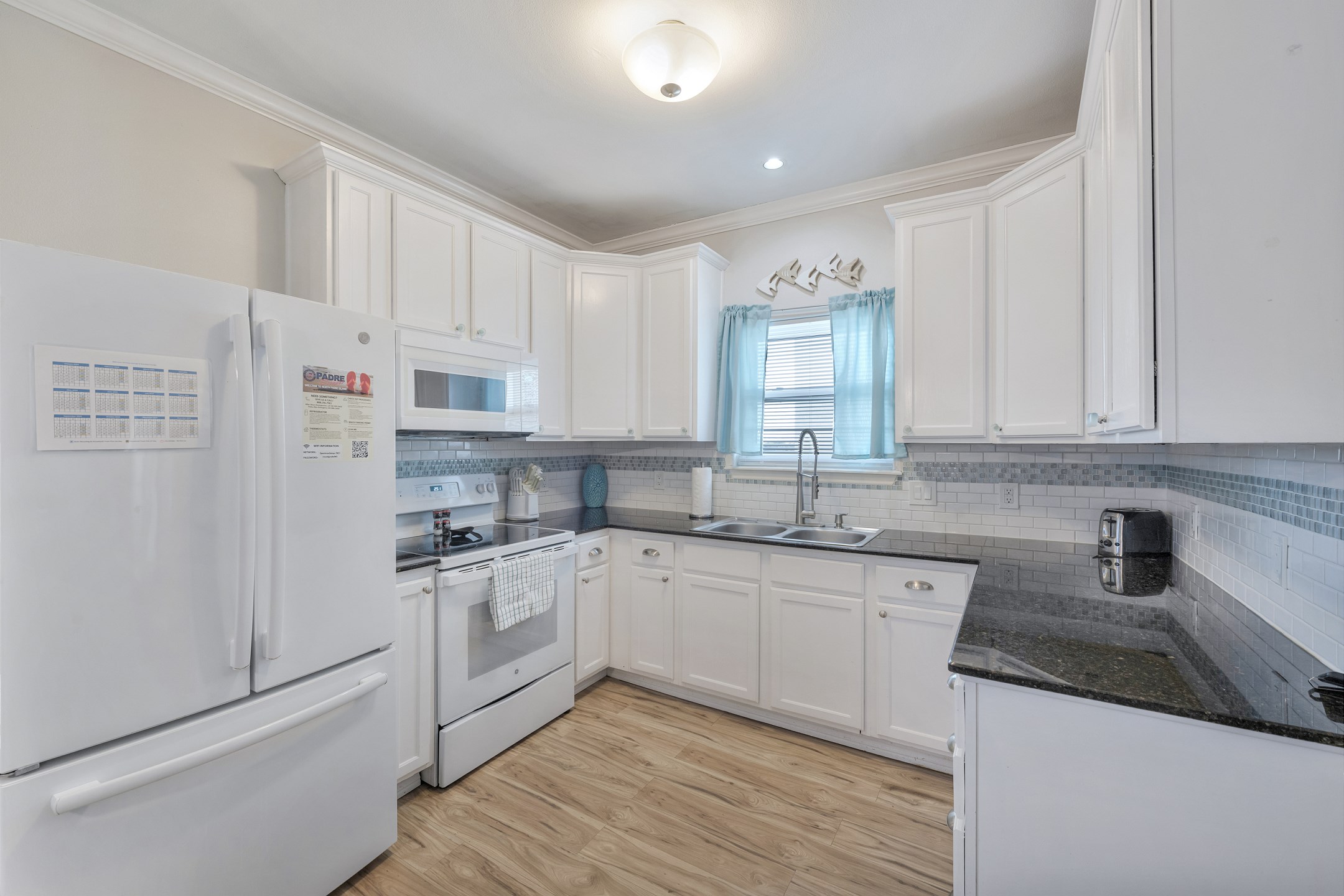 Fully equipped kitchen with everything you need in your vacation rental - plenty of counter space and full size appliances 