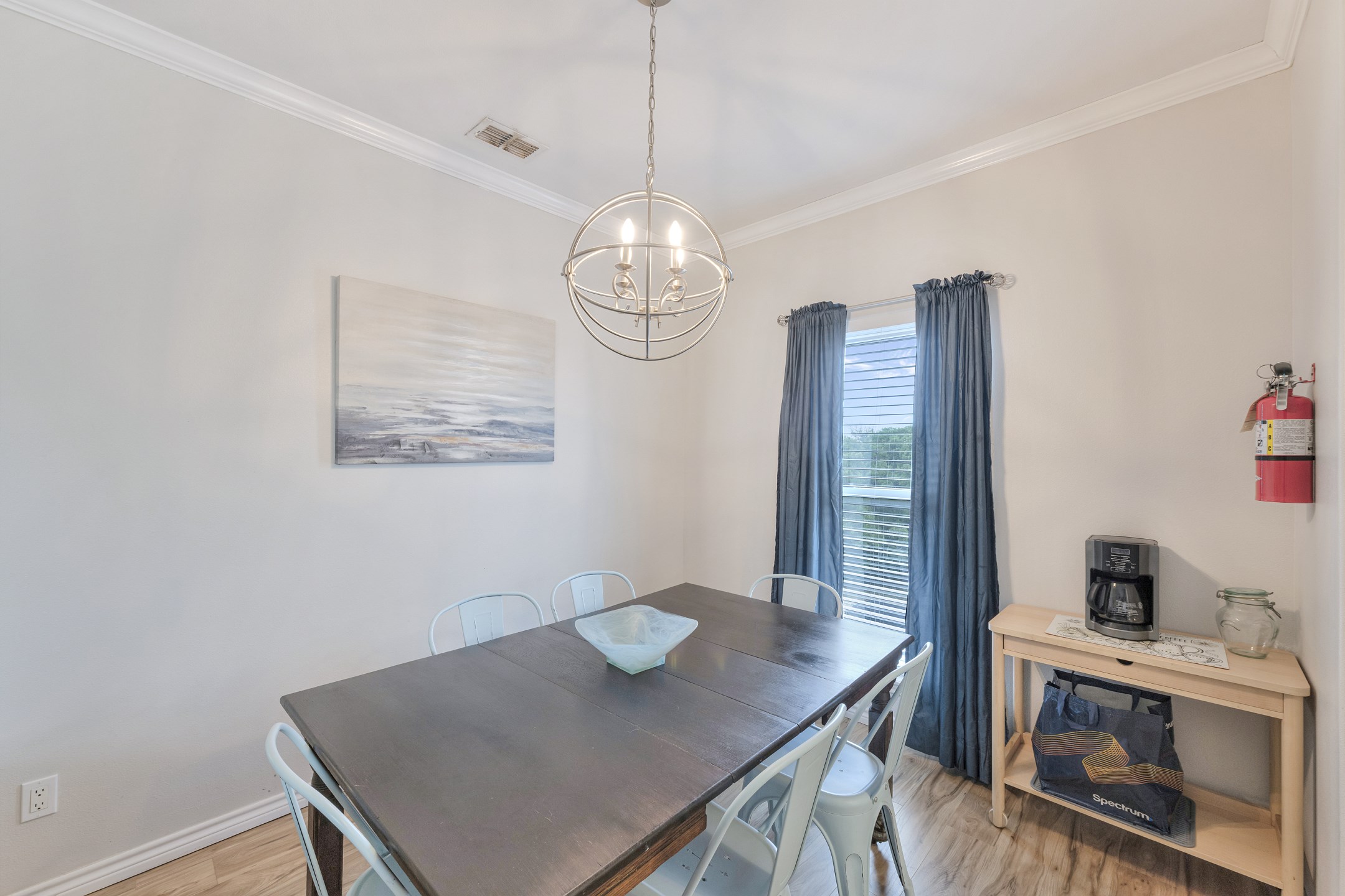 Large dining space with seating for six for family gatherings 