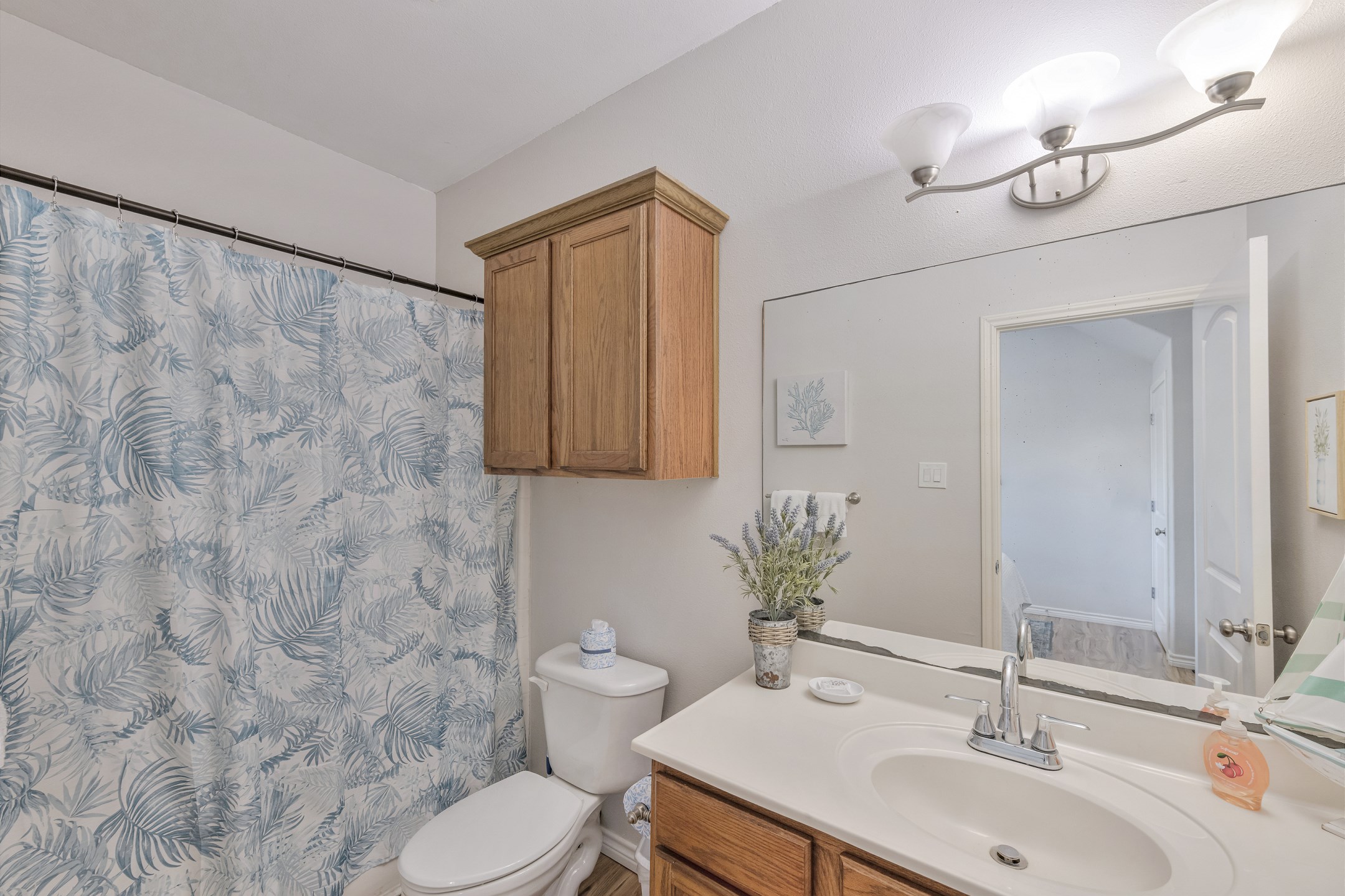 Private bathroom with tub/shower combo off the third bedroom
