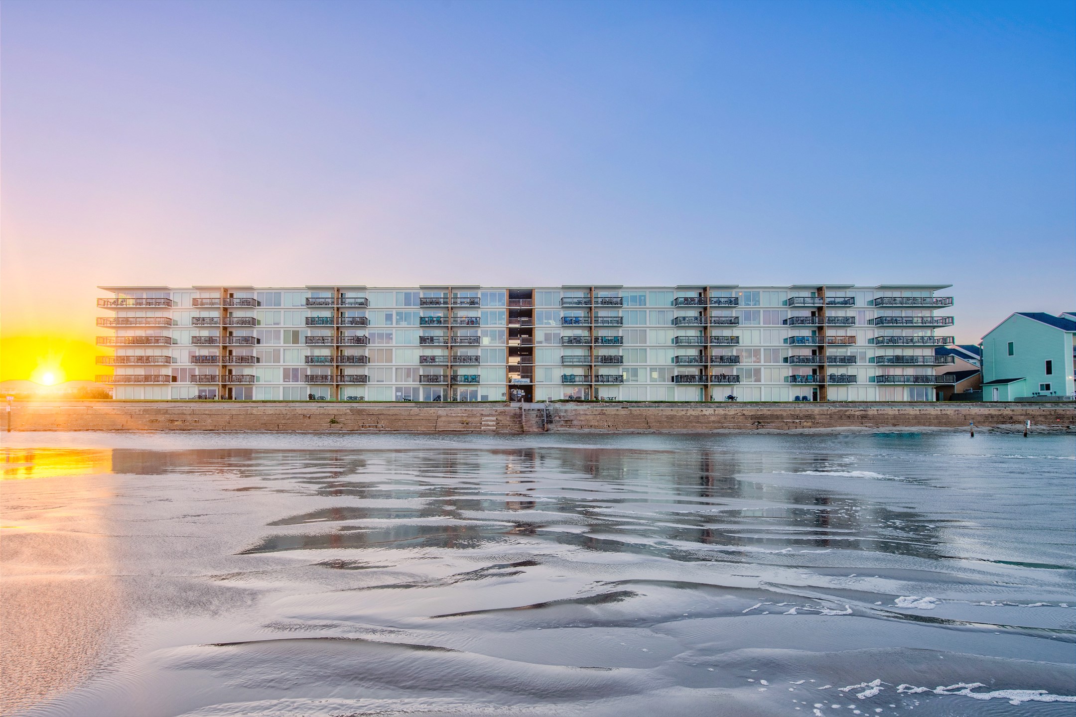 Savor the enchanting coastal sunsets during your Island vacation