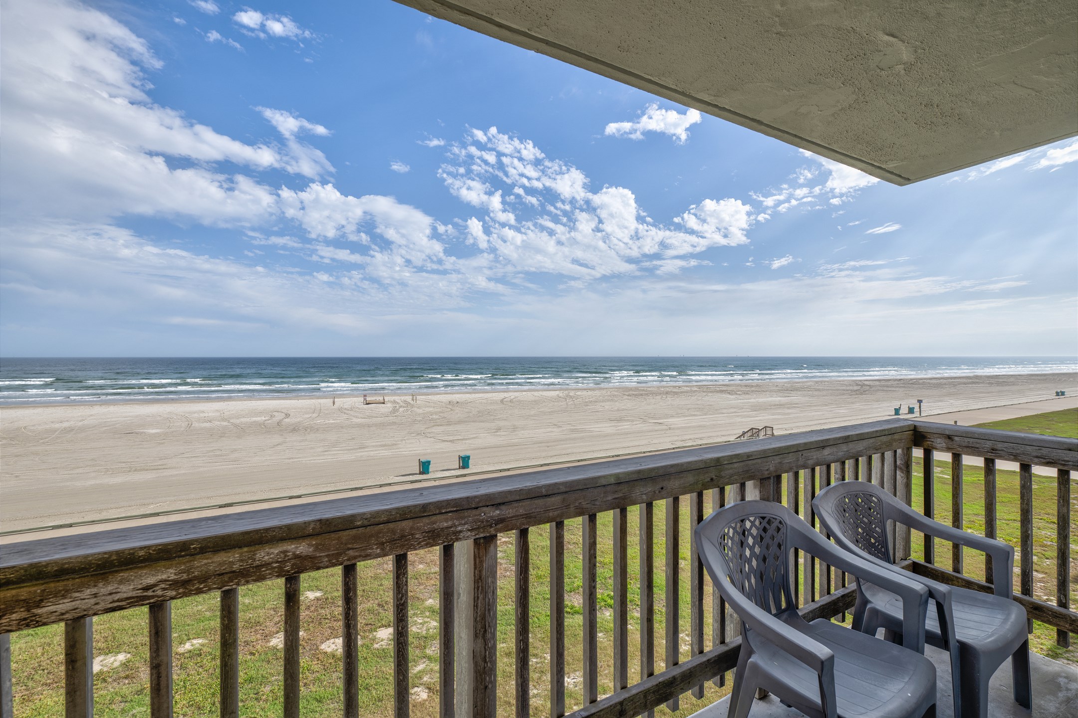 Amazing beachfront views directly from your private balcony - perfect spot to relax and enjoy your cup of coffee