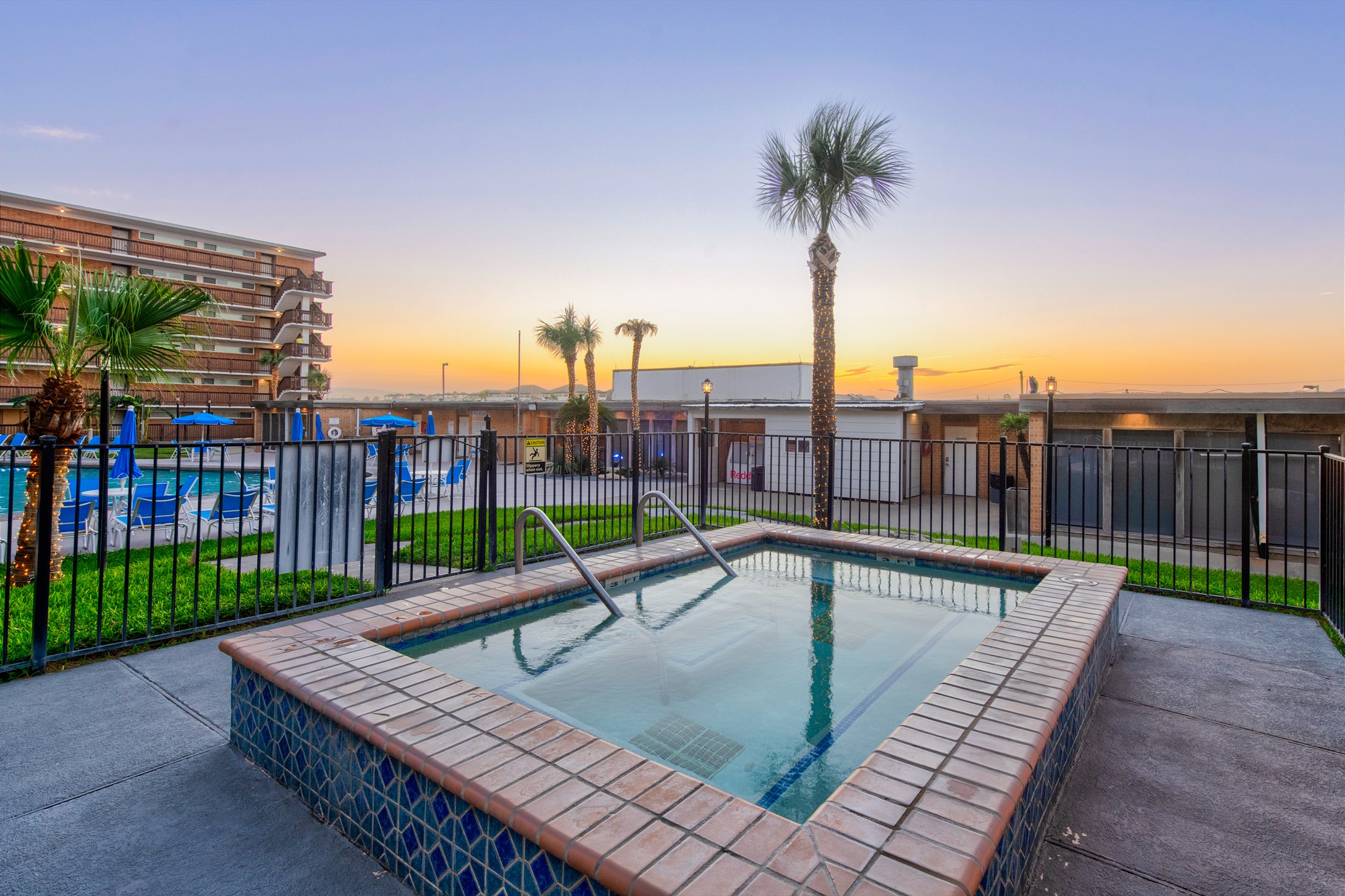 Visit the hot tub at sunset to take advantage of your luxury vacation