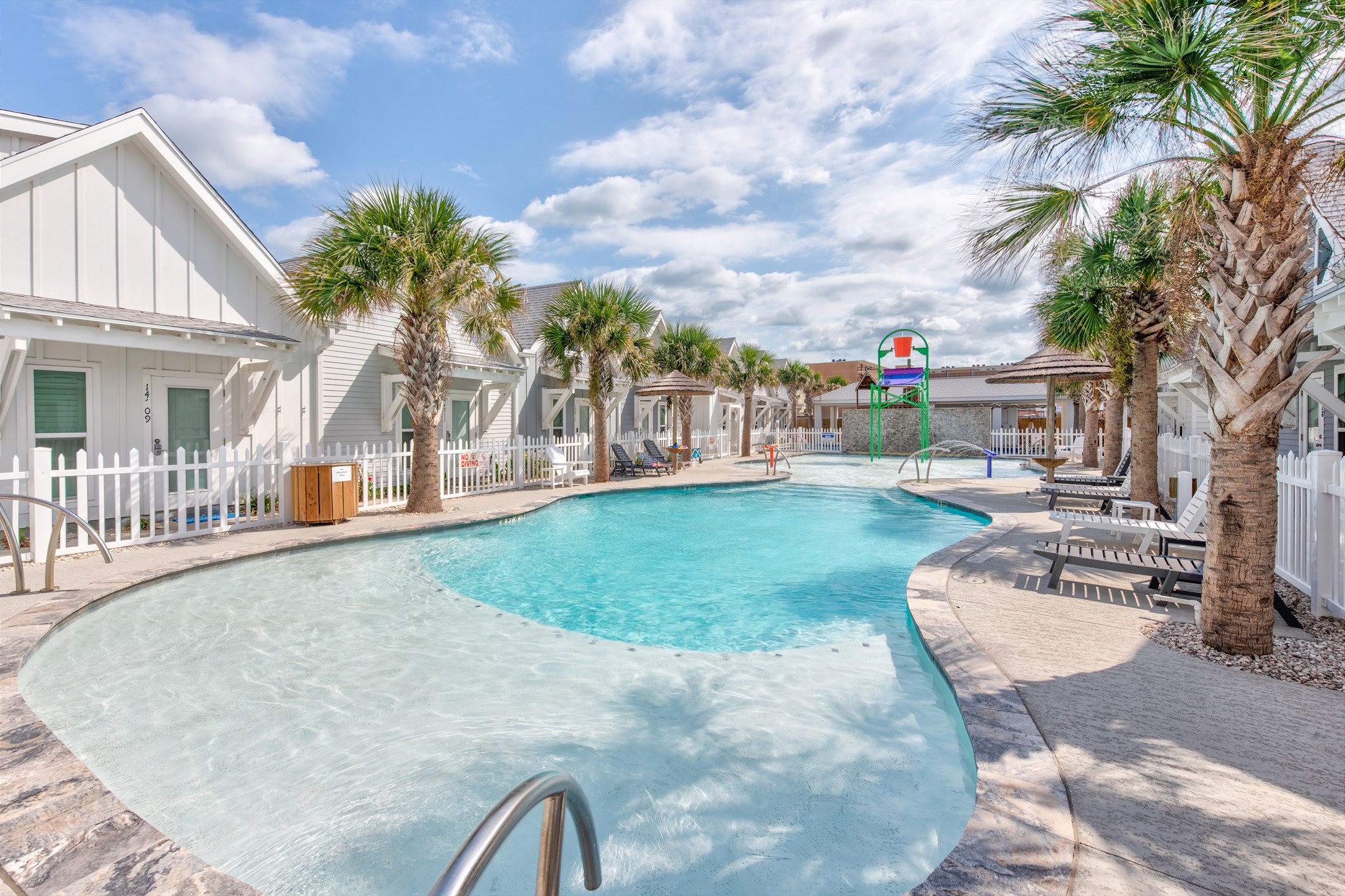 Pool that is heated in the cooler months with plenty of sun loungers to relax on