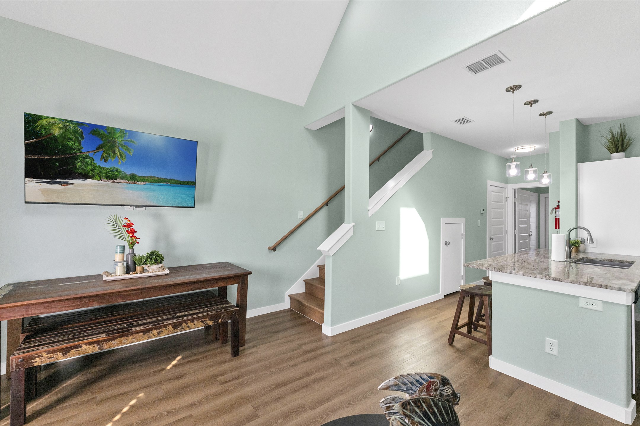 Spacious family lounge with connected dining area and fully equipped kitchen