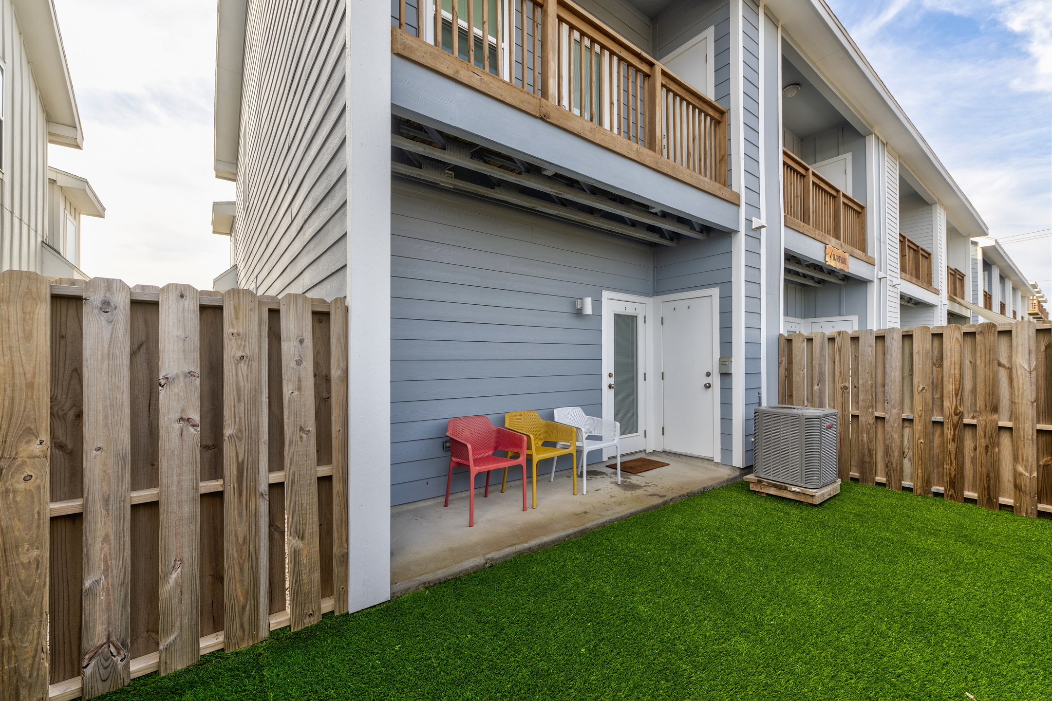 Inviting patio retreat with chairs, perfect for morning coffee or evening drinks