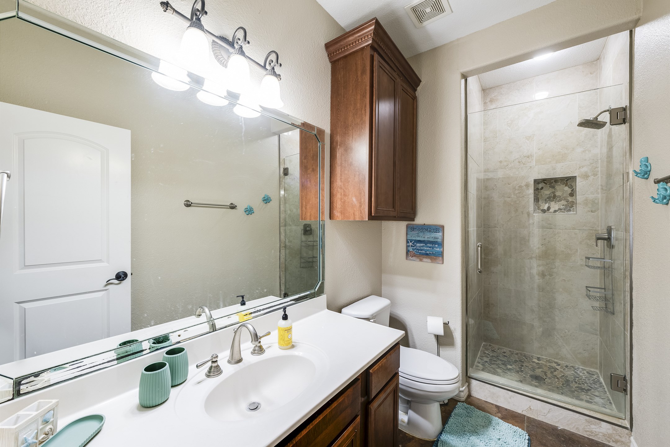 Guest bathroom on the third floor with walk in shower 