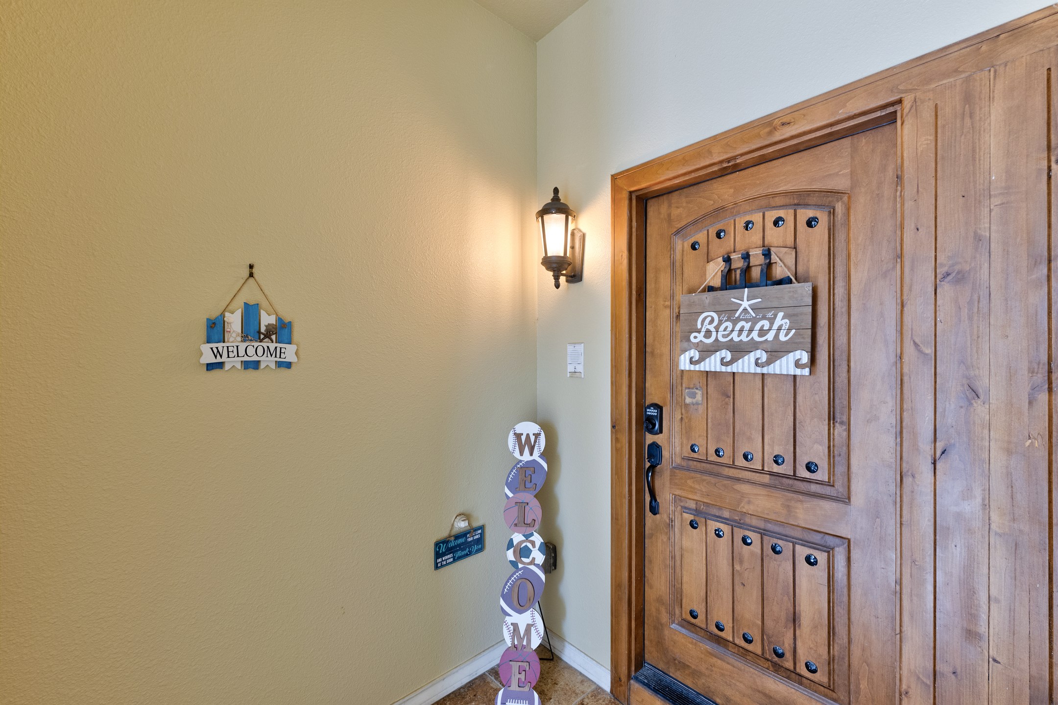 Second floor front door entrance with coded lock for extra security 