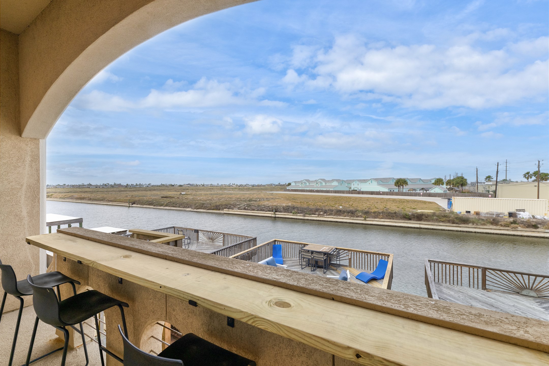 Amazing canal water views from the private balcony, just steps off the living space