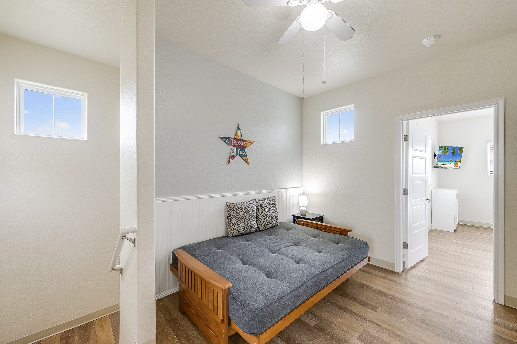 Loft area on the second floor with full size futon and flat screen TV