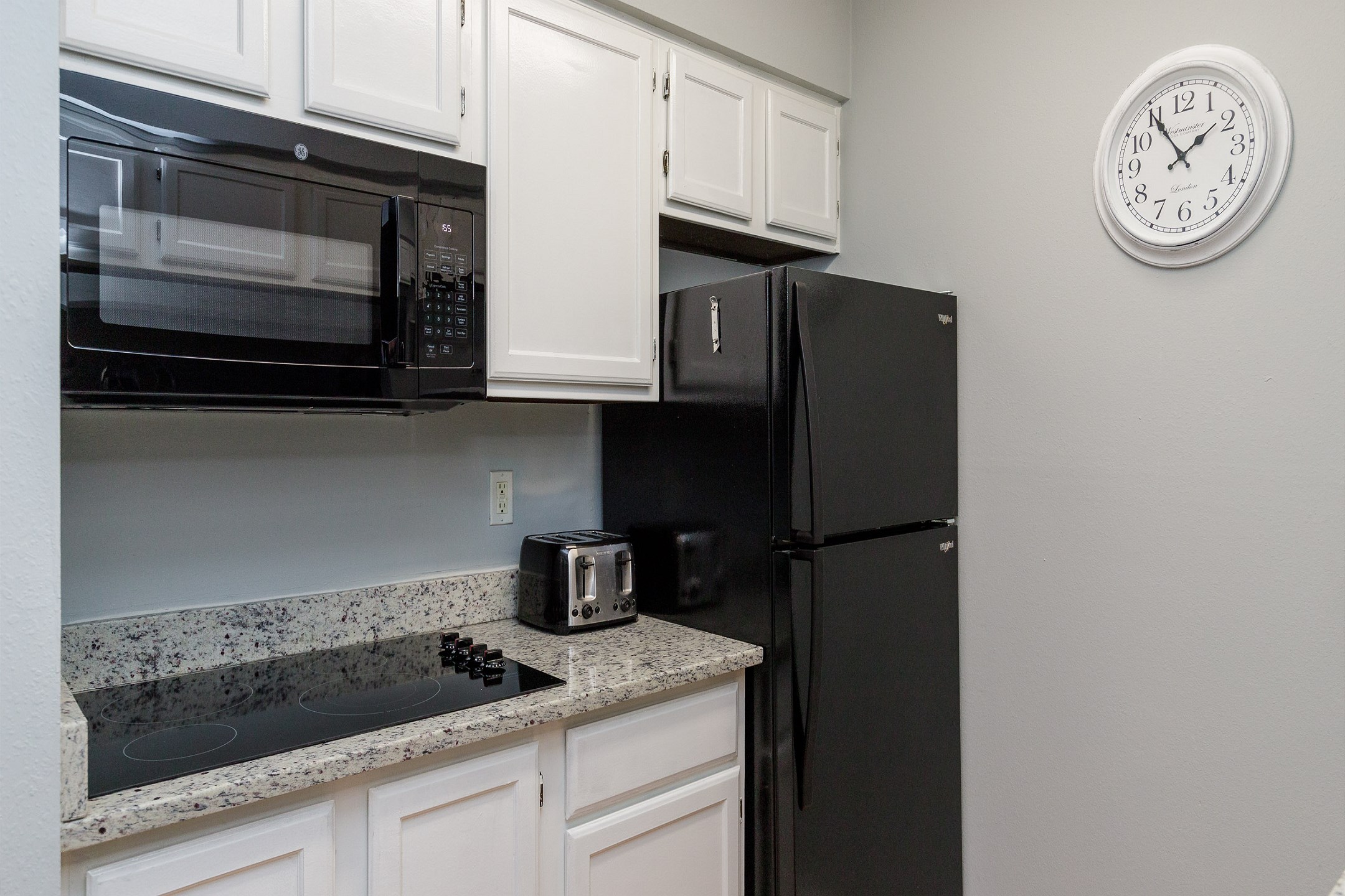 Well equipped kitchen with new appliances, counter tops and cabinets