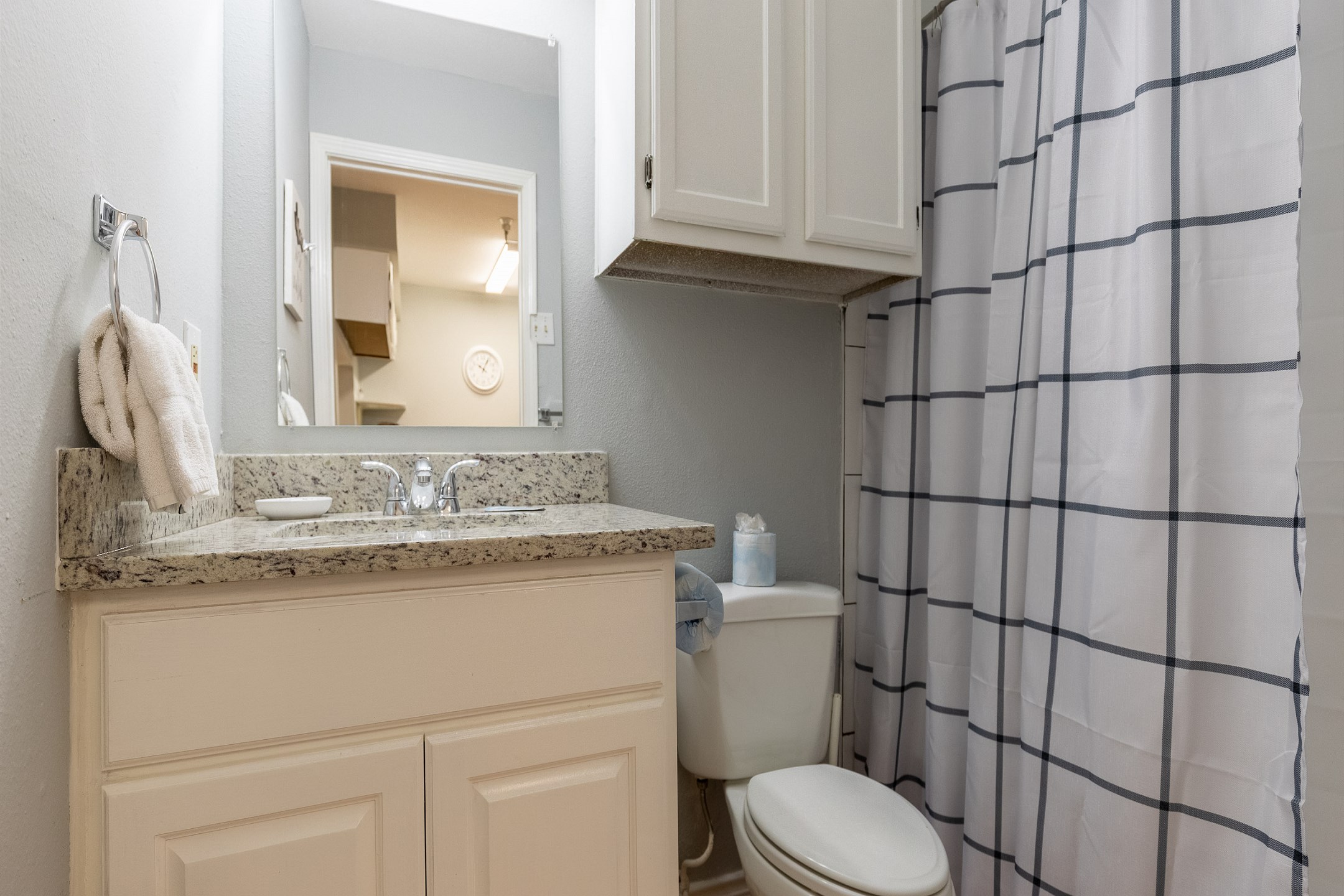 Updated bathroom with new counter tops, tub and shower combo