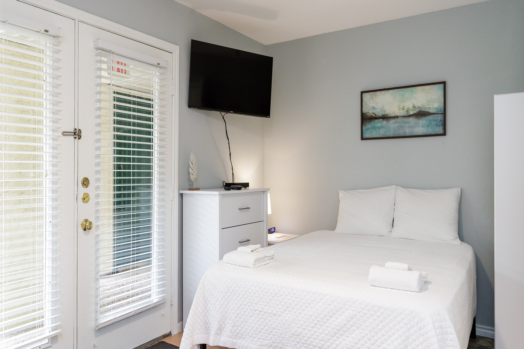 Comfy full size bed with flat screen TV