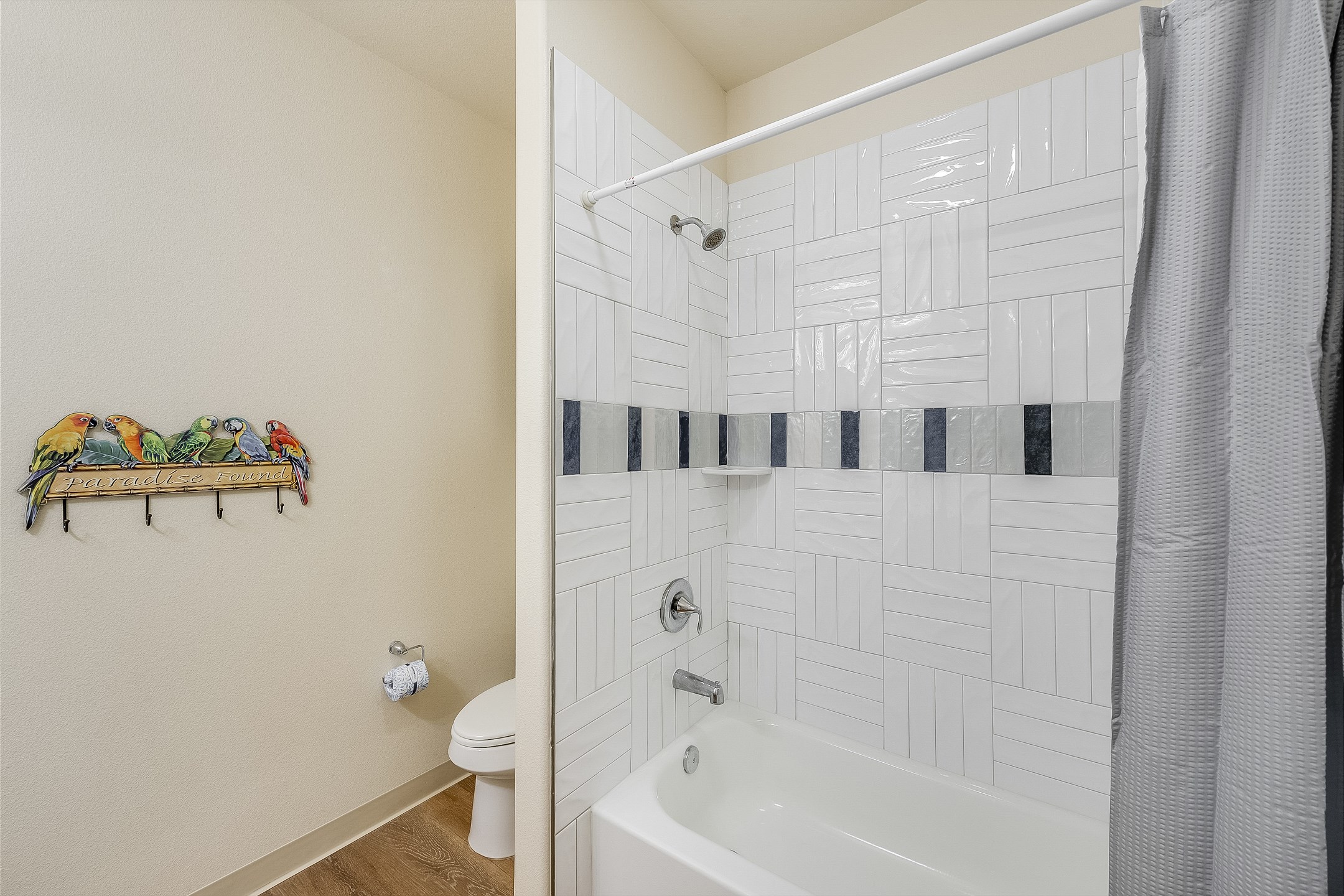 Guest bathroom on second floor with tub and shower