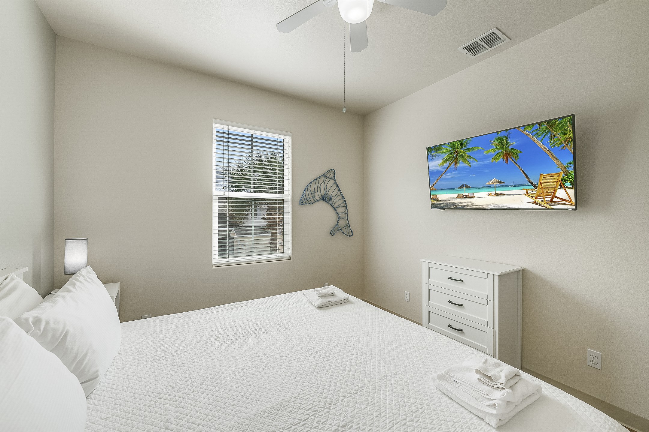 Third bedroom on the second floor with king size bed and flat screen TV