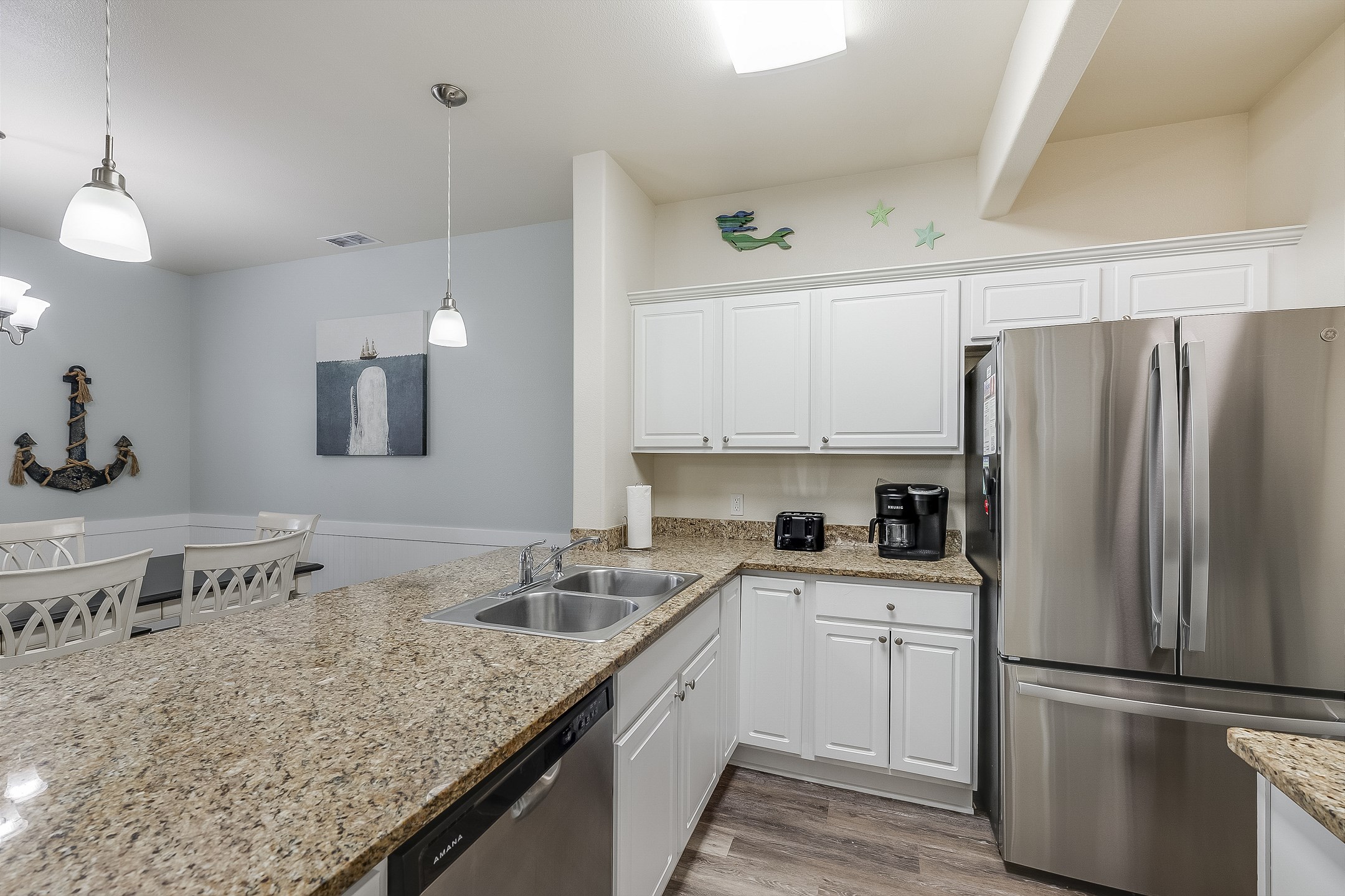 Fully equipped vacation rental kitchen with stainless steel appliances