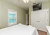 Second bedroom with queen size bed and flat screen TV